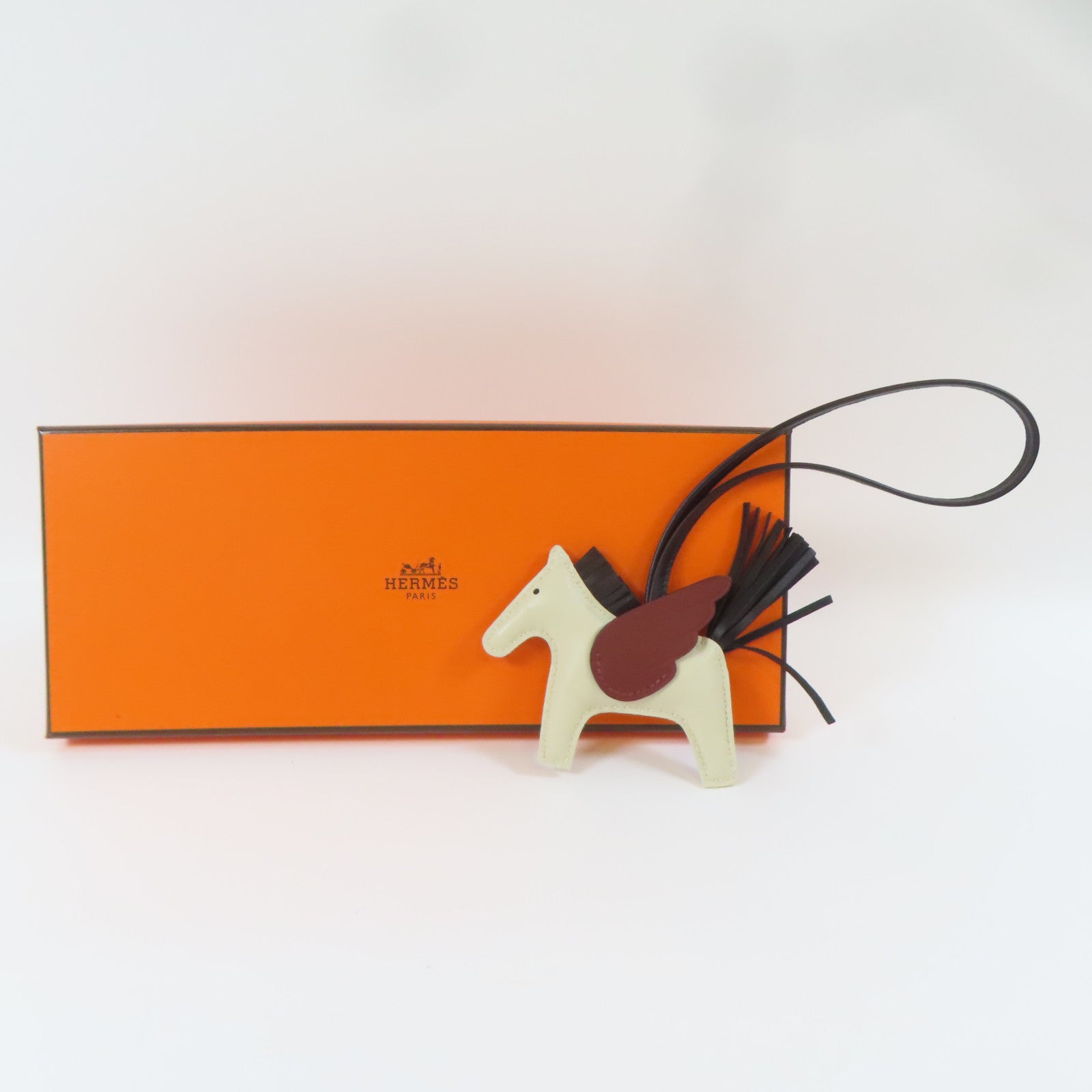 HERMES Swift皮革Rodeo Pegase PM掛飾Craie/白色/Noir/黑色/Rouge H/啡紅色