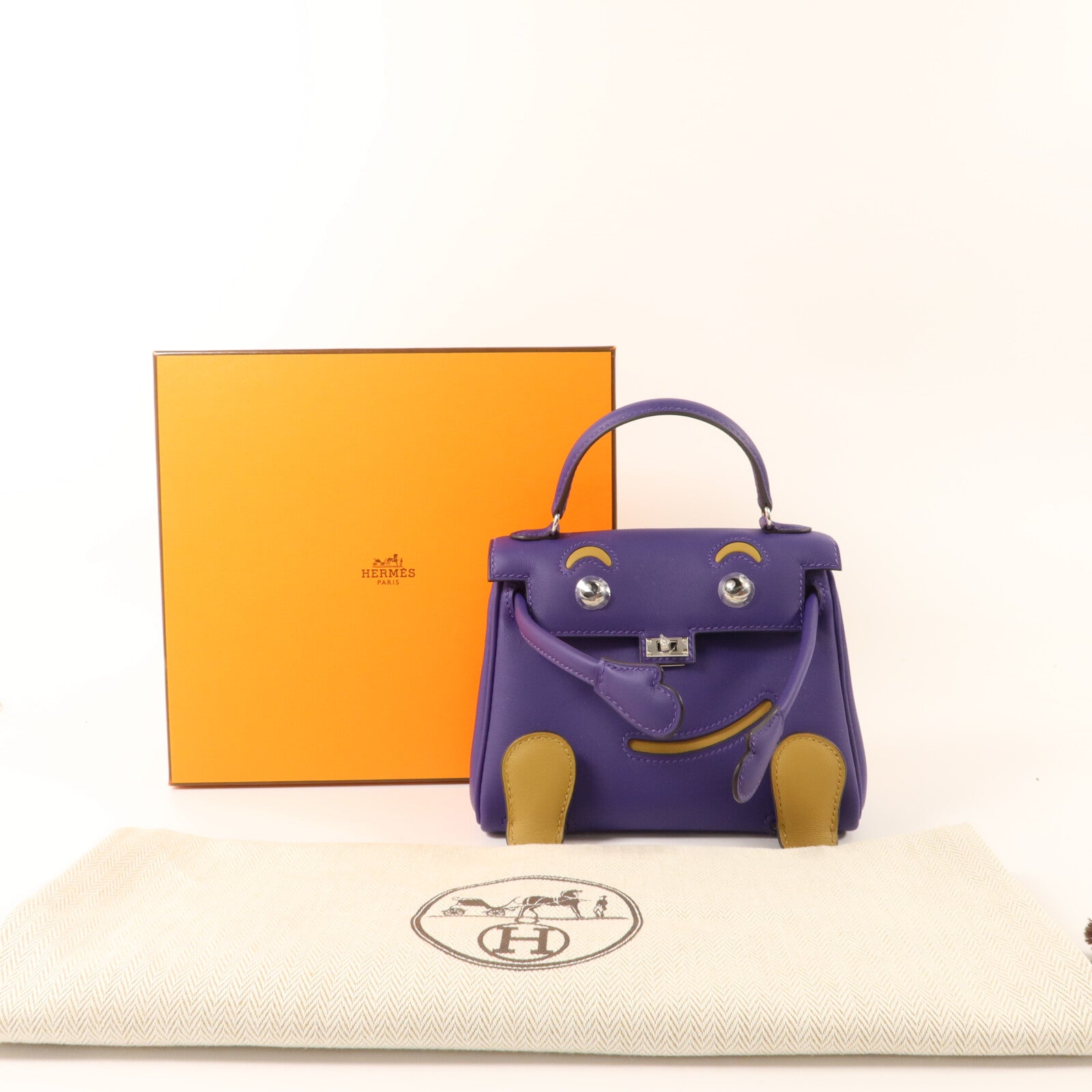 HERMES Swift皮革Kelly Doll手挽袋Purple/Dune