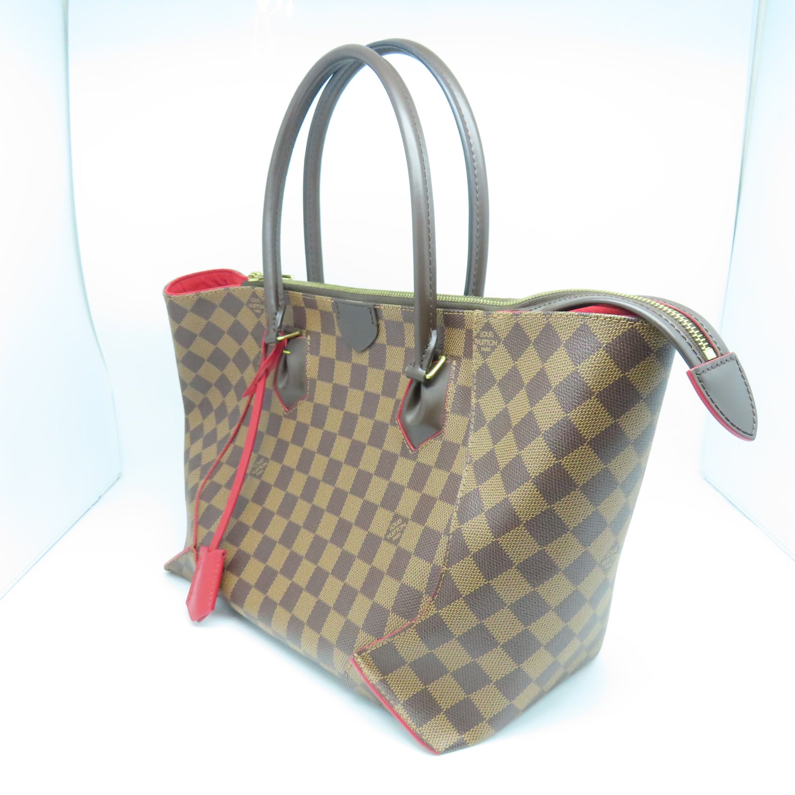 LOUIS VUITTON Damier Caissa MM gold buckle handle bag brown/red