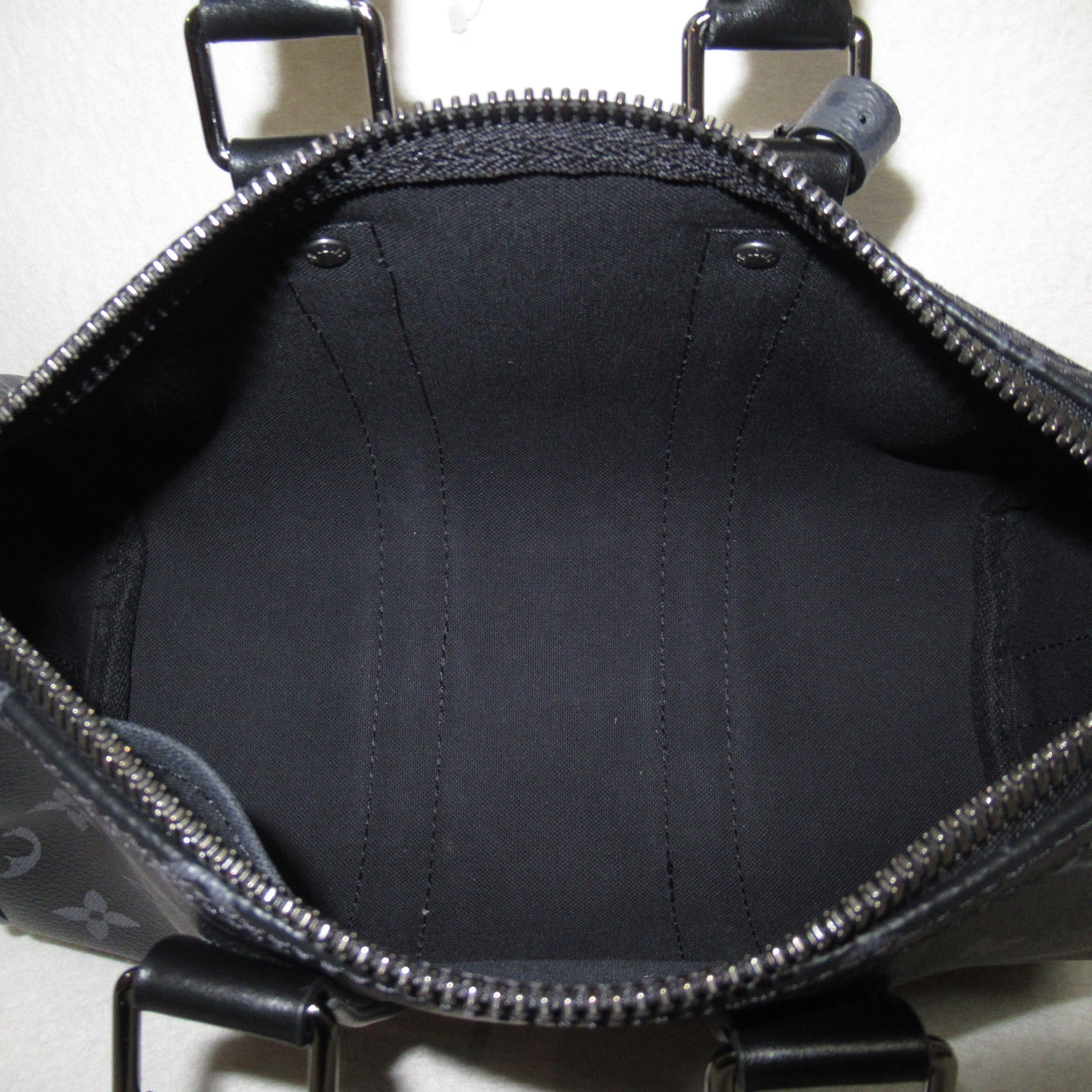 LOUIS VUITTON Monogram Eclipse Keepall Bandouliere 25銀扣手挽肩背兩用袋黑色