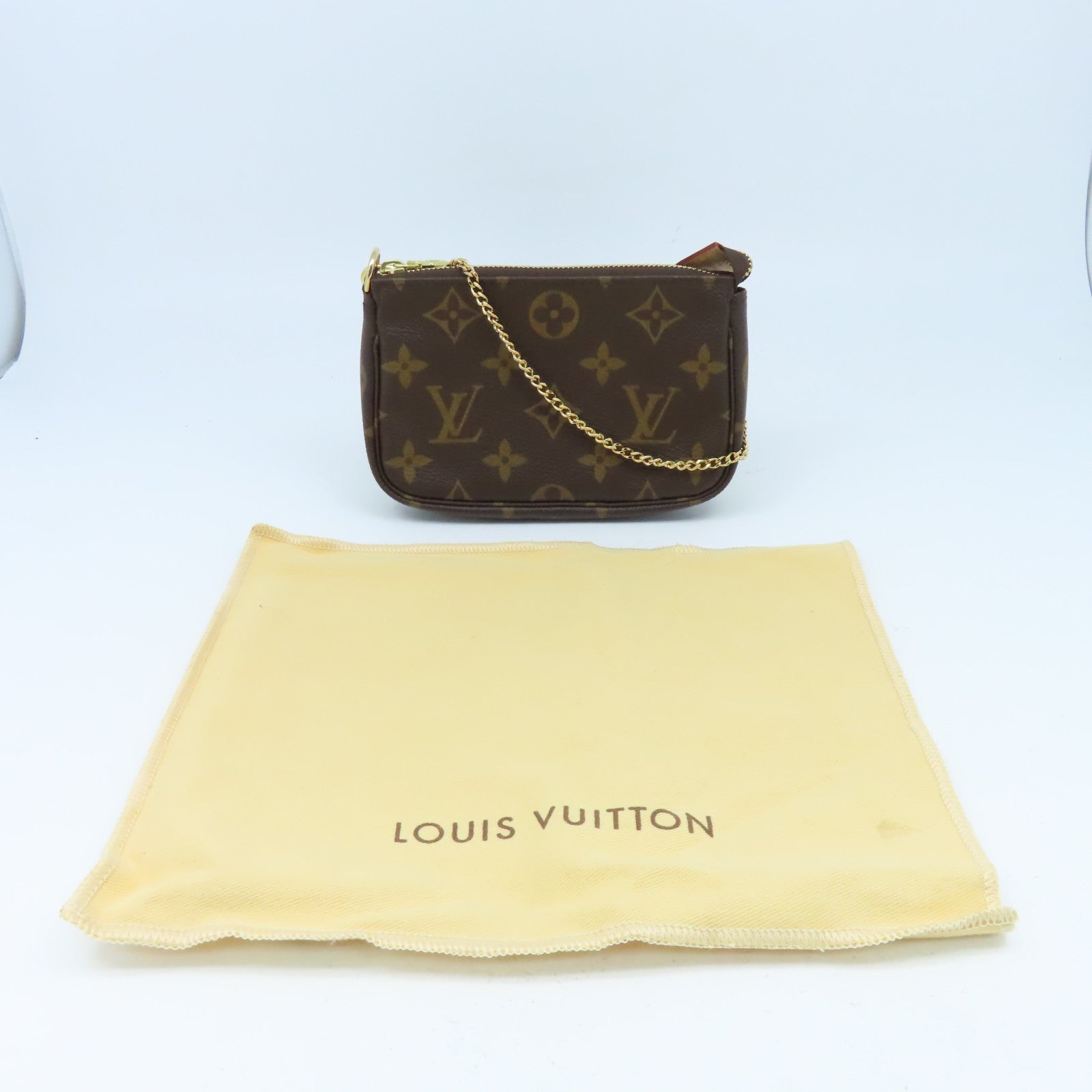 LOUIS VUITTON Monogram Pouch金扣手拿包啡色