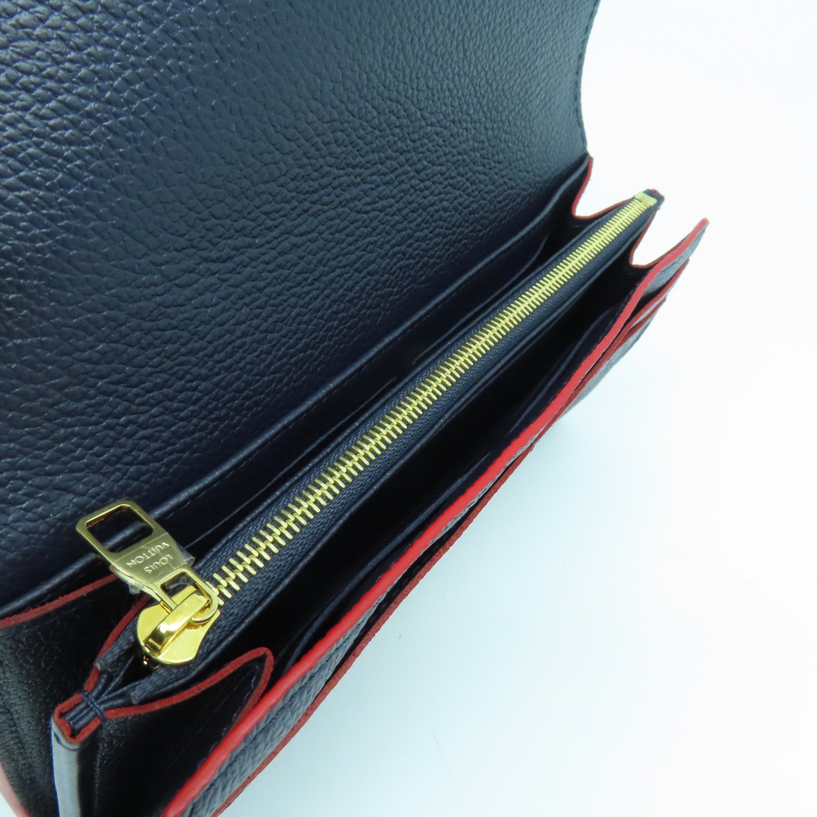 LOUIS VUITTON Monogram Empreinte Sarah gold buckle long wallet dark blue