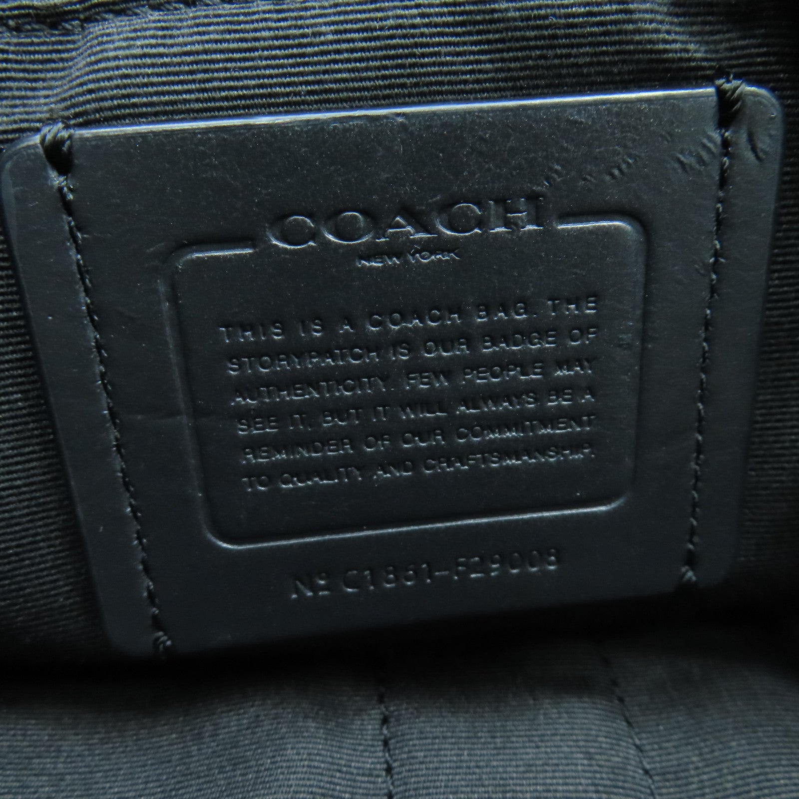 COACH 牛皮皮革Rucksack金扣背包黑色