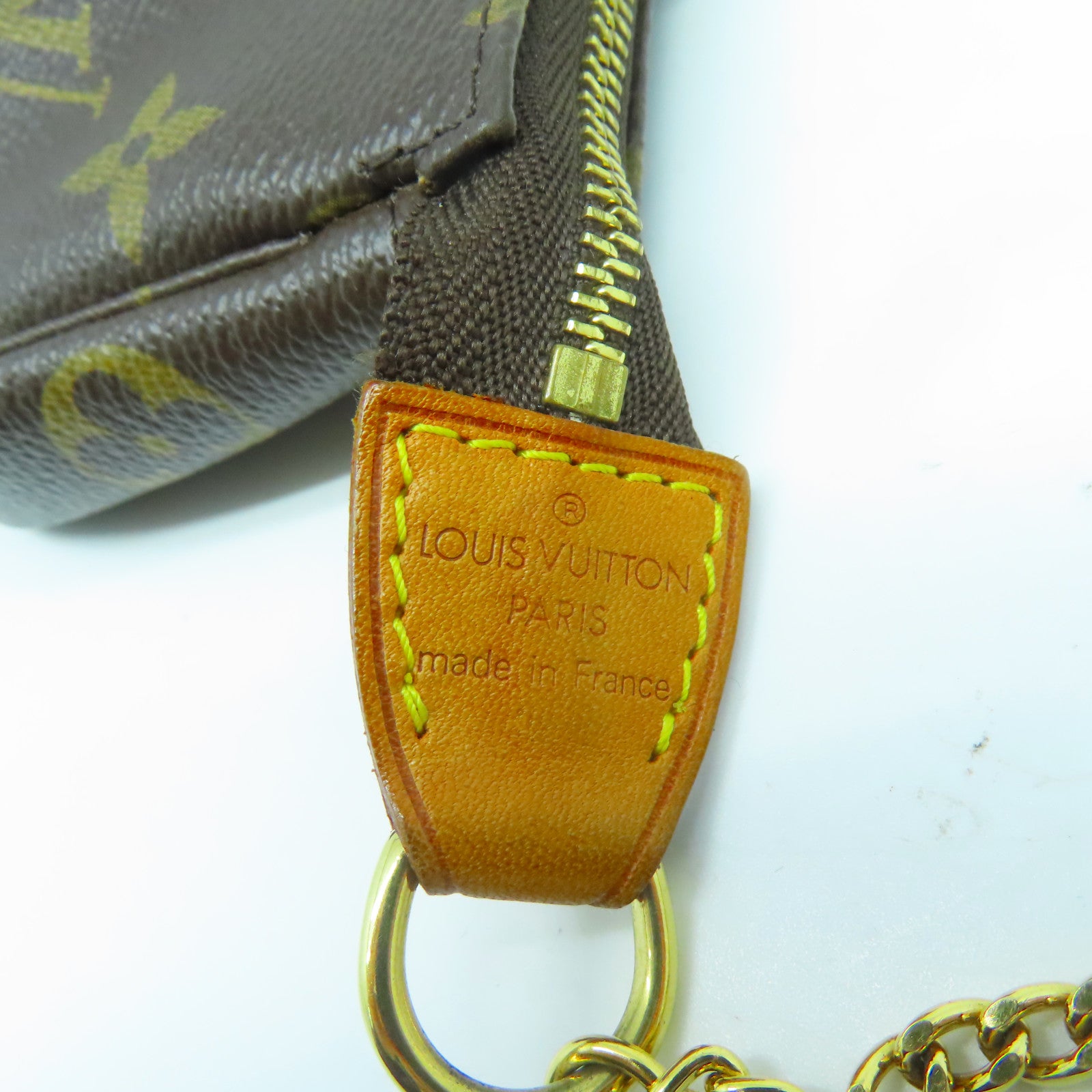 LOUIS VUITTON Monogram Mini Pochette Accessoires金扣手挽袋啡色