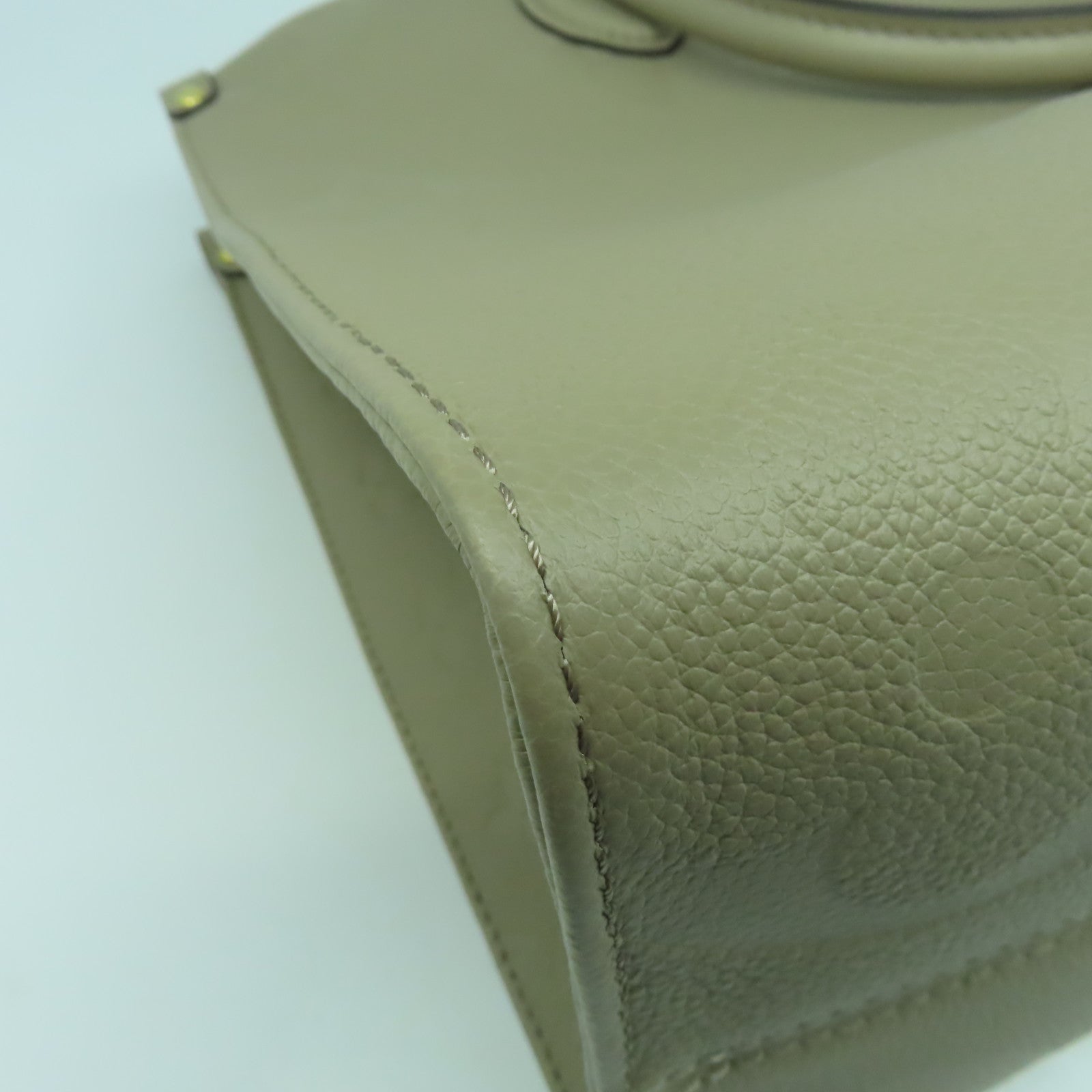 LOUIS VUITTON Monogram Empreinte On The Go MM金扣手挽肩背兩用袋米色