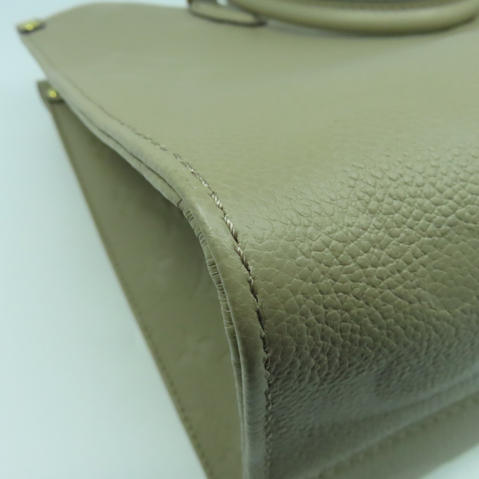LOUIS VUITTON Monogram Empreinte On The Go MM金扣手挽肩背兩用袋米色