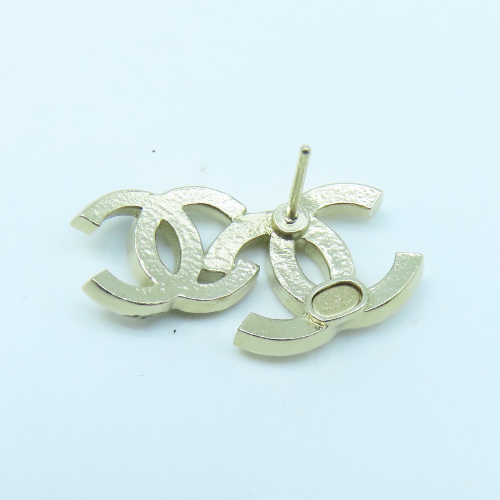 CHANEL Metal Earrings Gold Buckle Black/White
