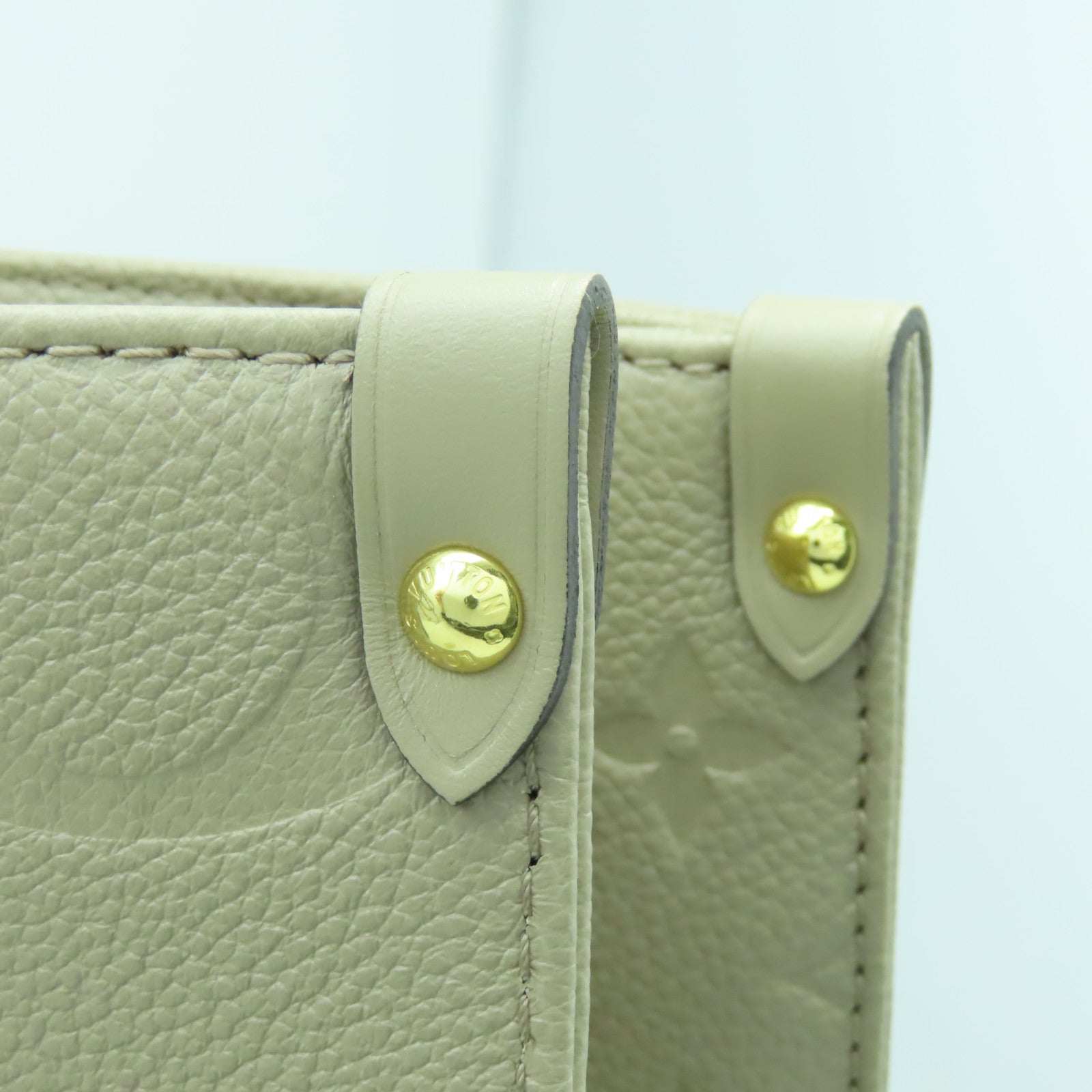 LOUIS VUITTON Monogram Empreinte On The Go MM金扣手挽肩背兩用袋米色