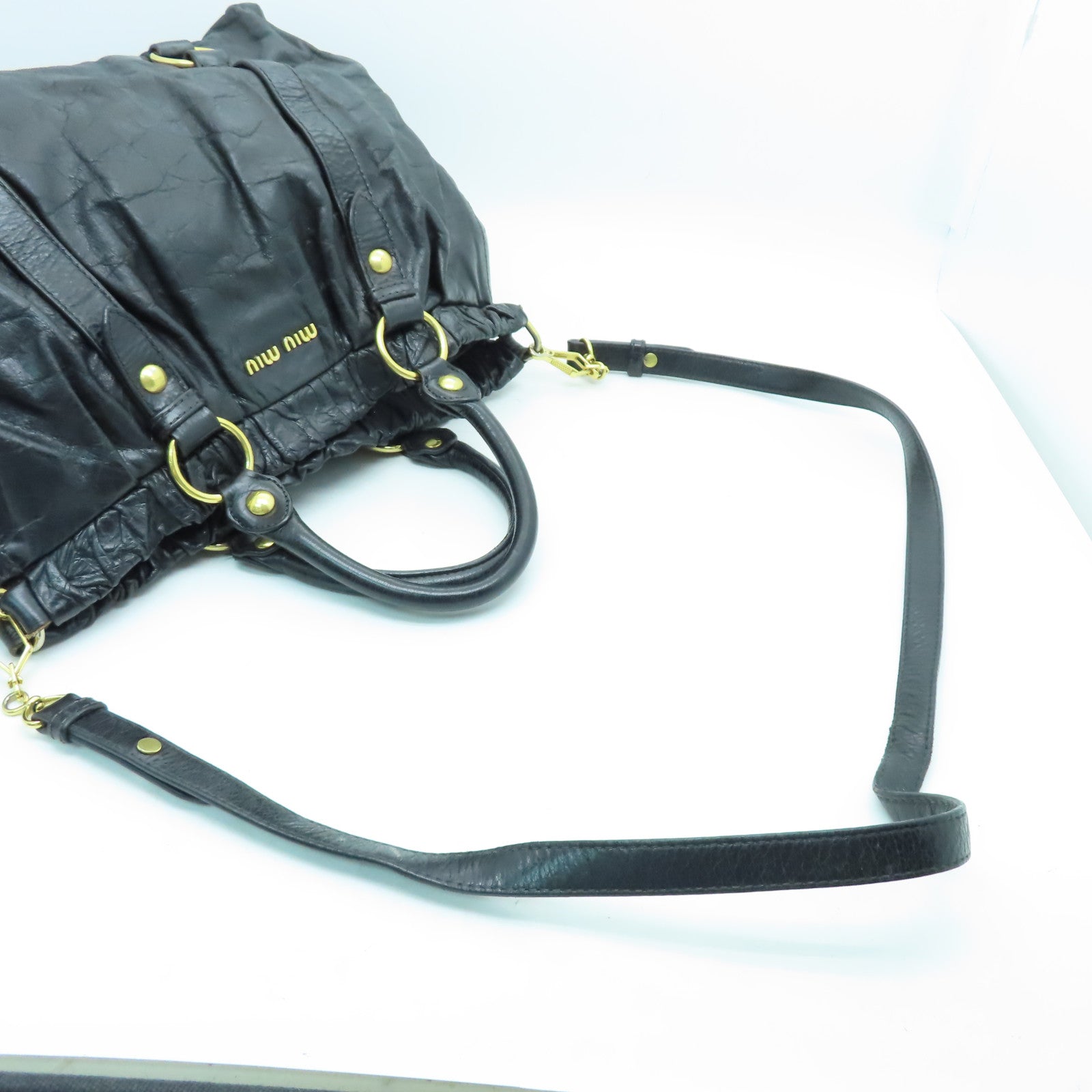 Miu Miu 【激減優惠】牛皮皮革Shoulder Bag金扣肩背袋黑色