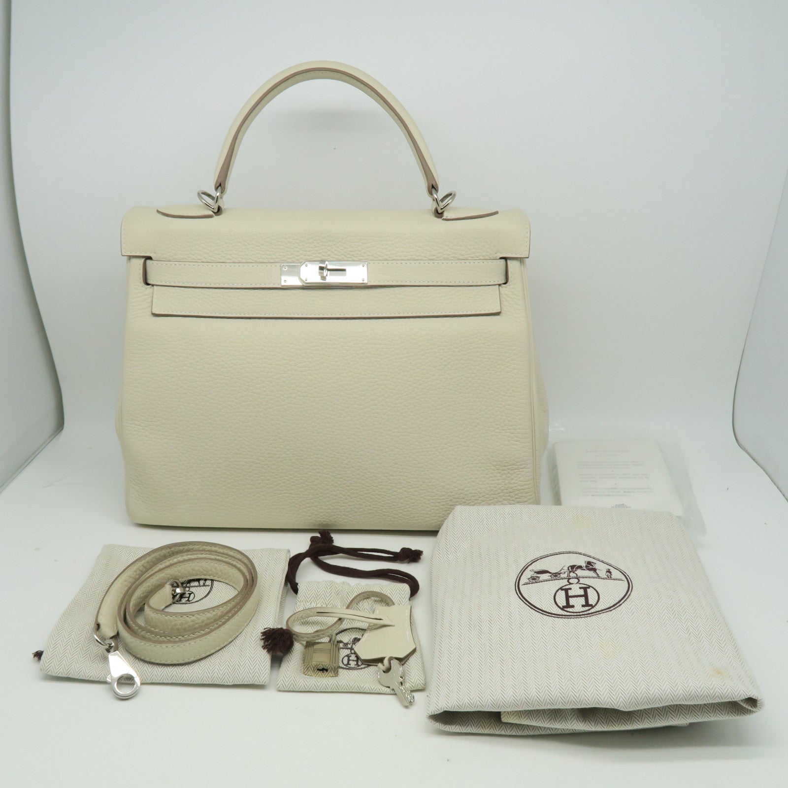 HERMES 【激減優惠】Clemence皮革Kelly 32銀扣手挽袋米白色