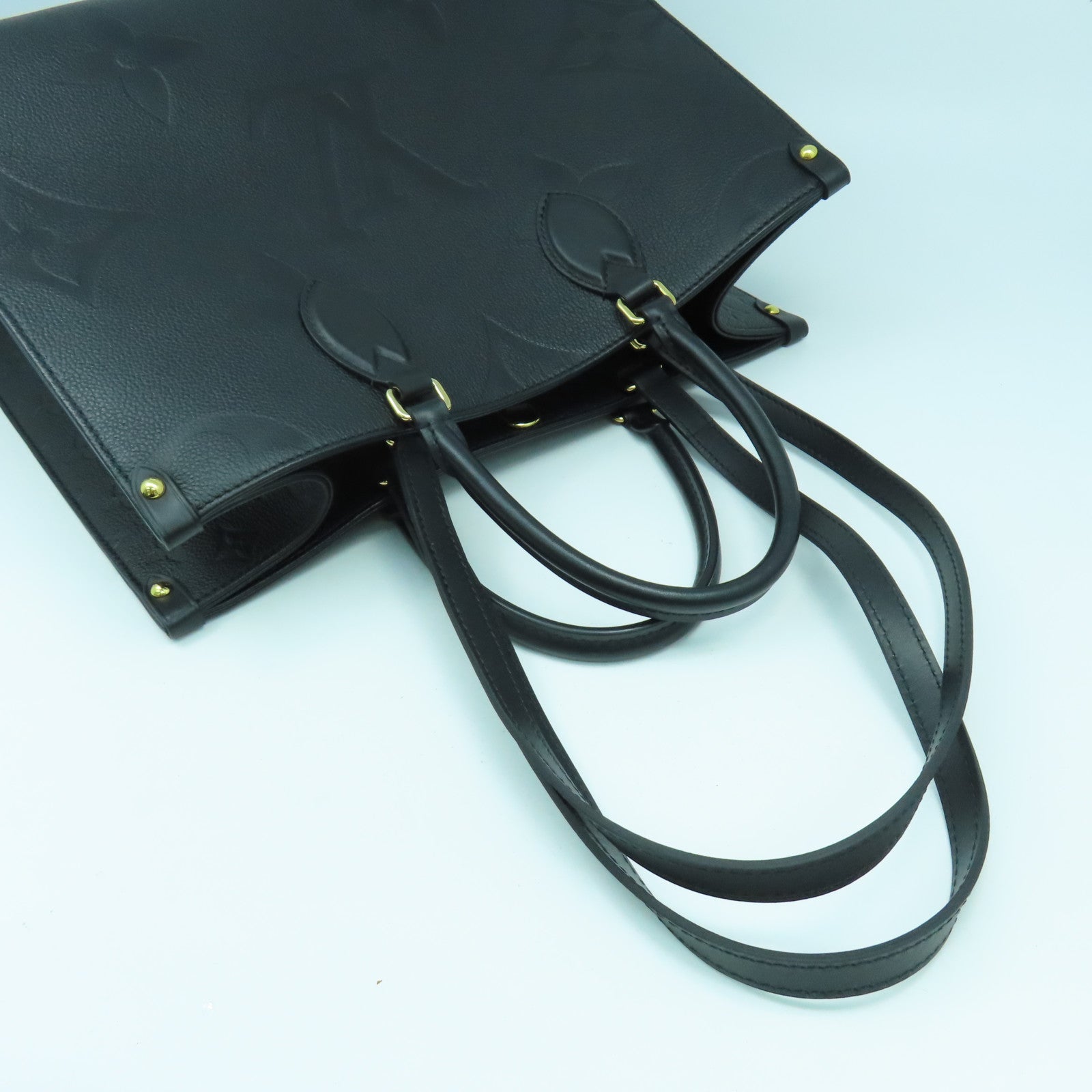 LOUIS VUITTON Monogram Empreinte On The Go MM金扣手挽肩背兩用袋黑色