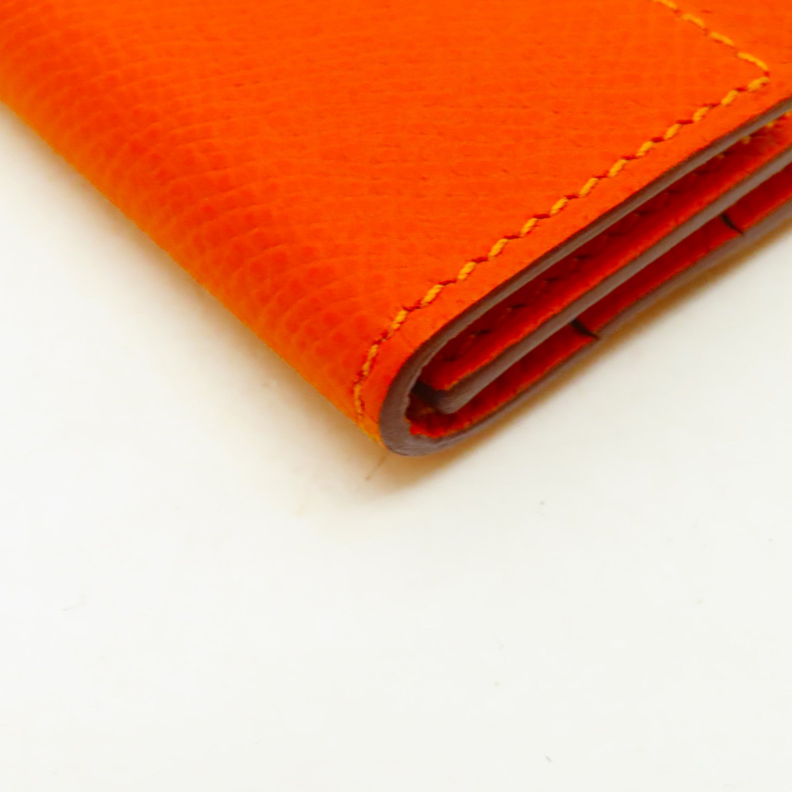 HERMES Epsom皮革Clic Mini Card Holder銀扣卡片套橙色