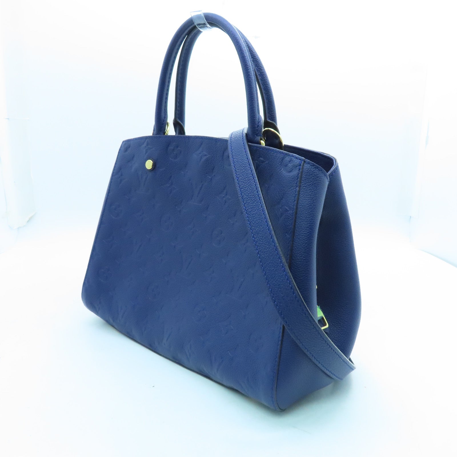 LOUIS VUITTON Monogram Empreinte Montaigne MM gold buckle handle shoulder bag dual-use blue
