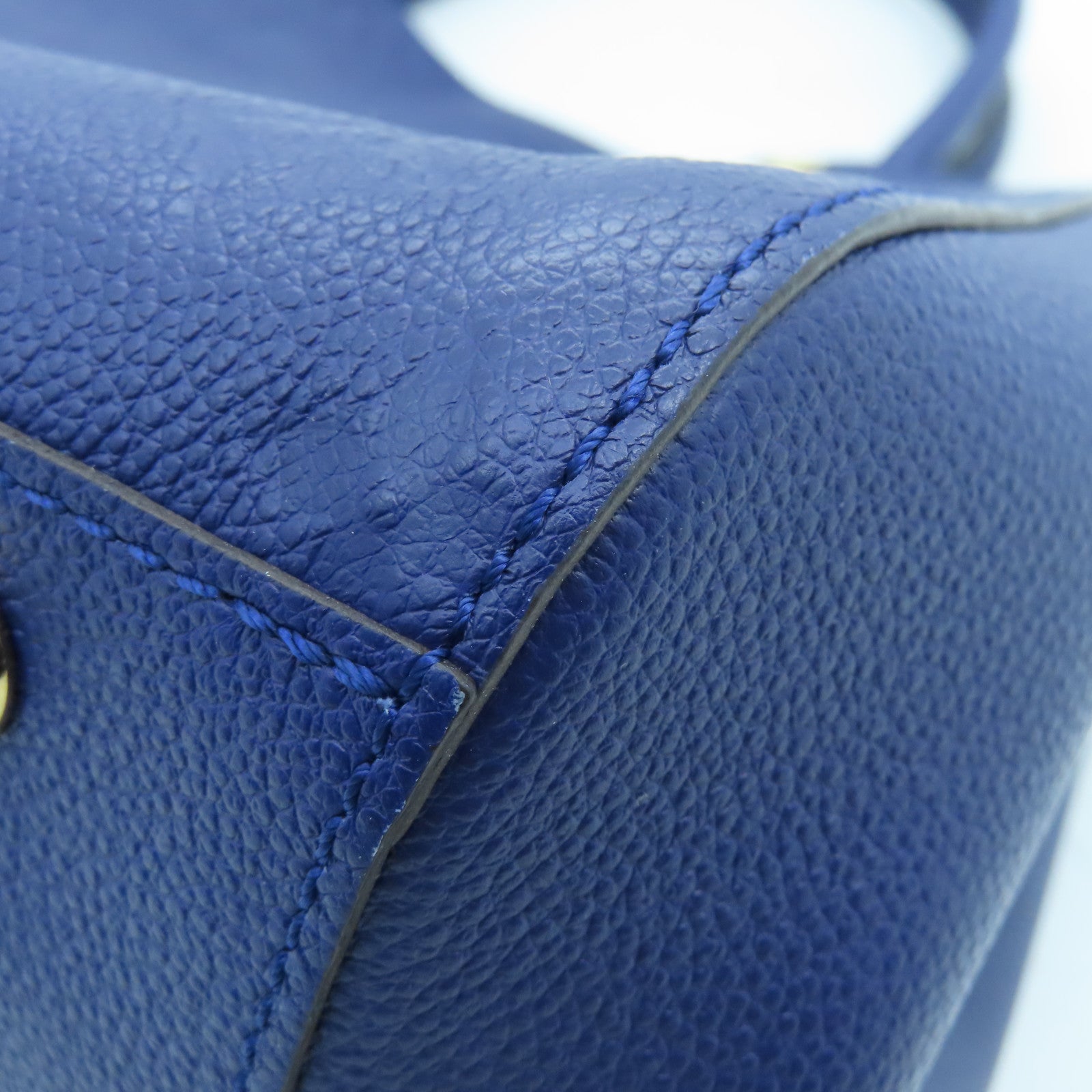 LOUIS VUITTON Monogram Empreinte Montaigne MM gold buckle handle shoulder bag dual-use blue
