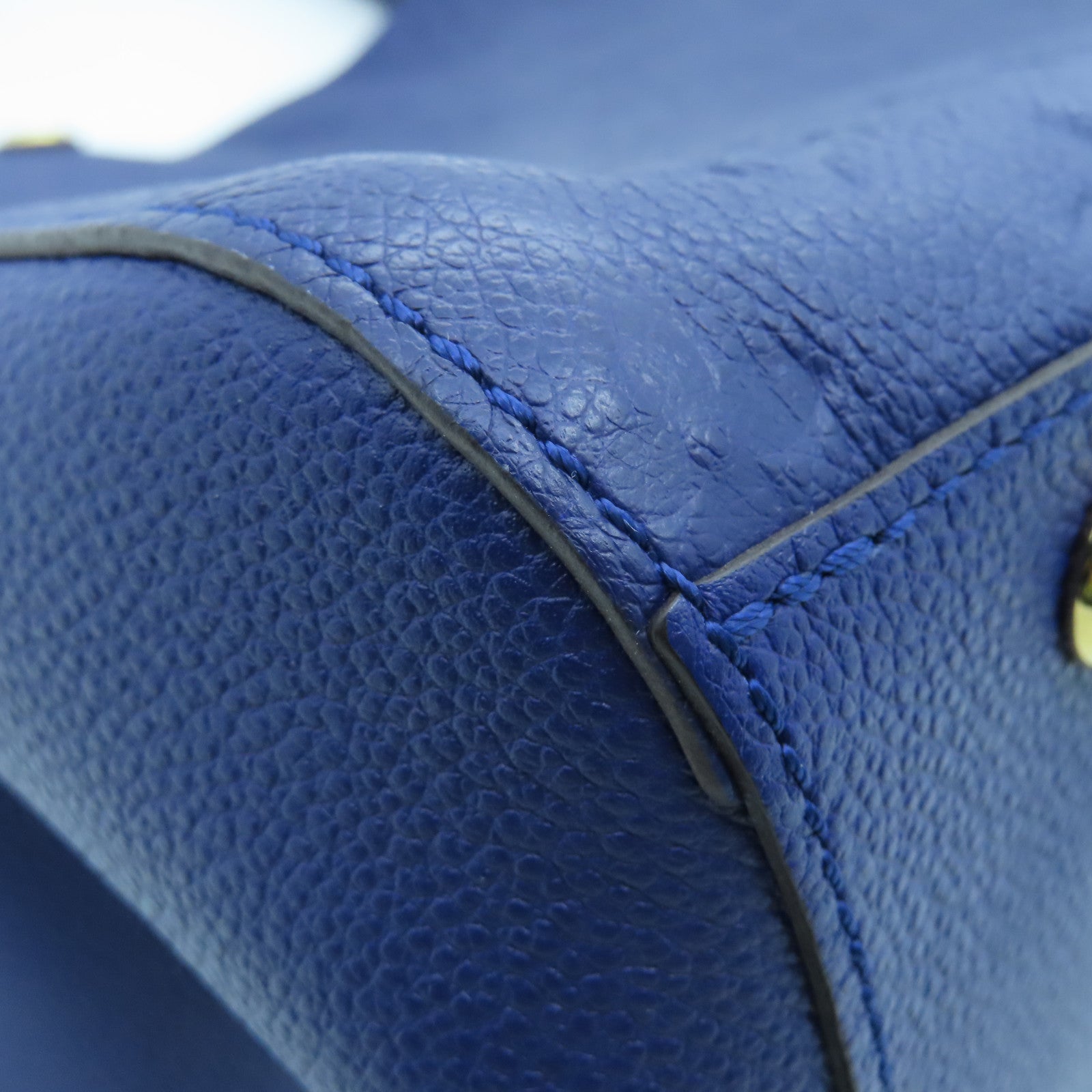 LOUIS VUITTON Monogram Empreinte Montaigne MM gold buckle handle shoulder bag dual-use blue