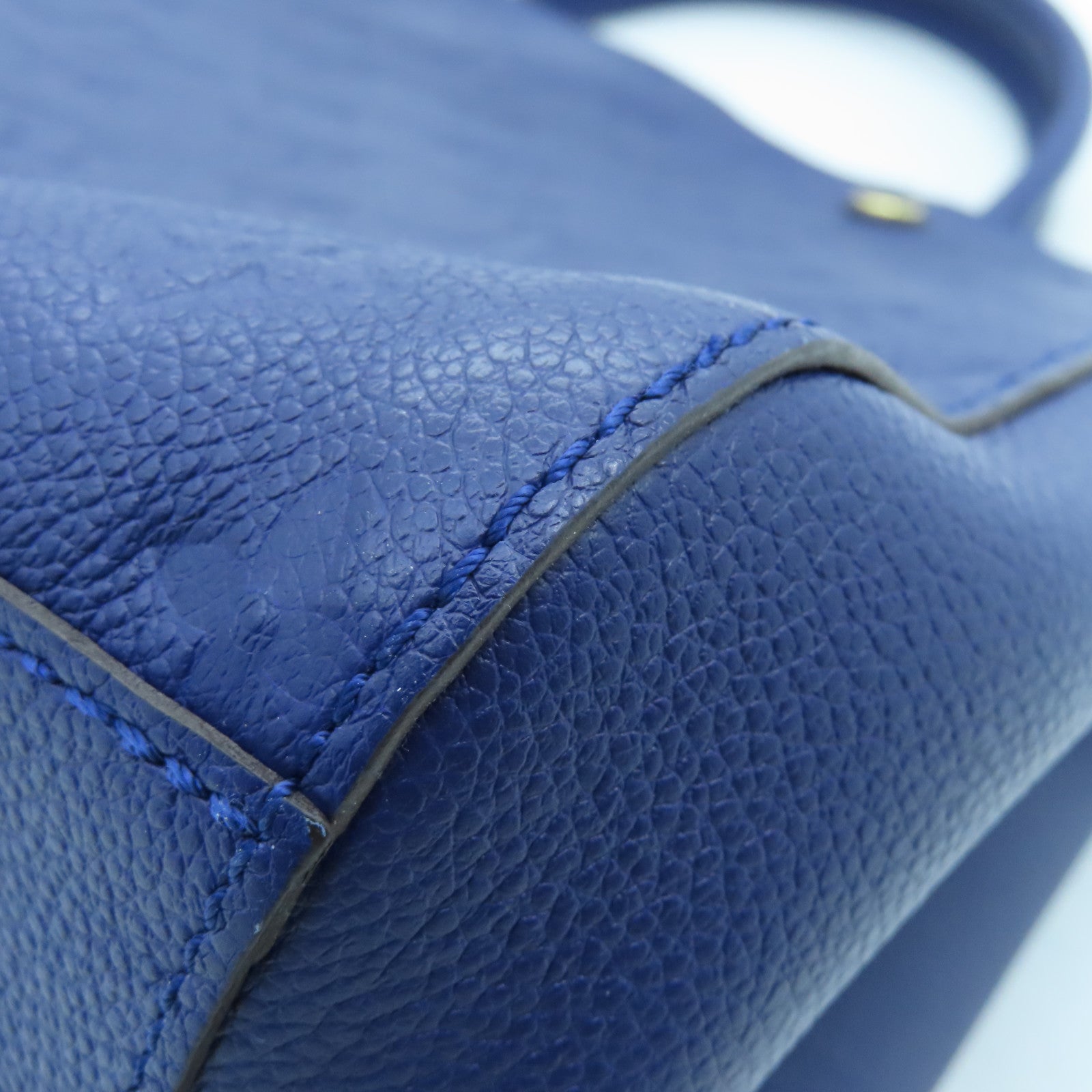 LOUIS VUITTON Monogram Empreinte Montaigne MM gold buckle handle shoulder bag dual-use blue