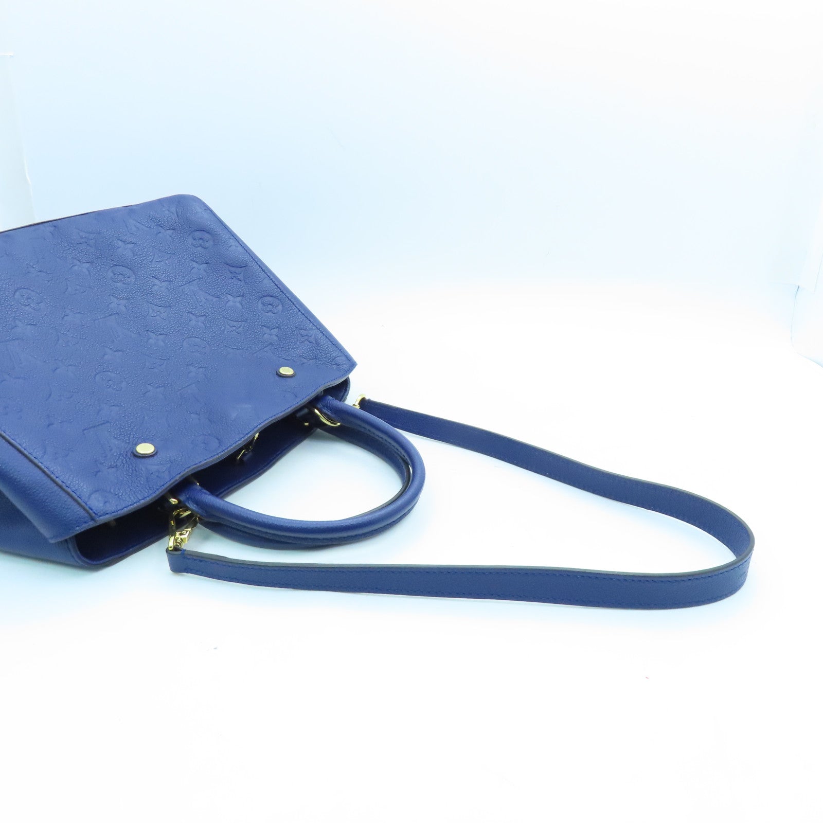 LOUIS VUITTON Monogram Empreinte Montaigne MM gold buckle handle shoulder bag dual-use blue