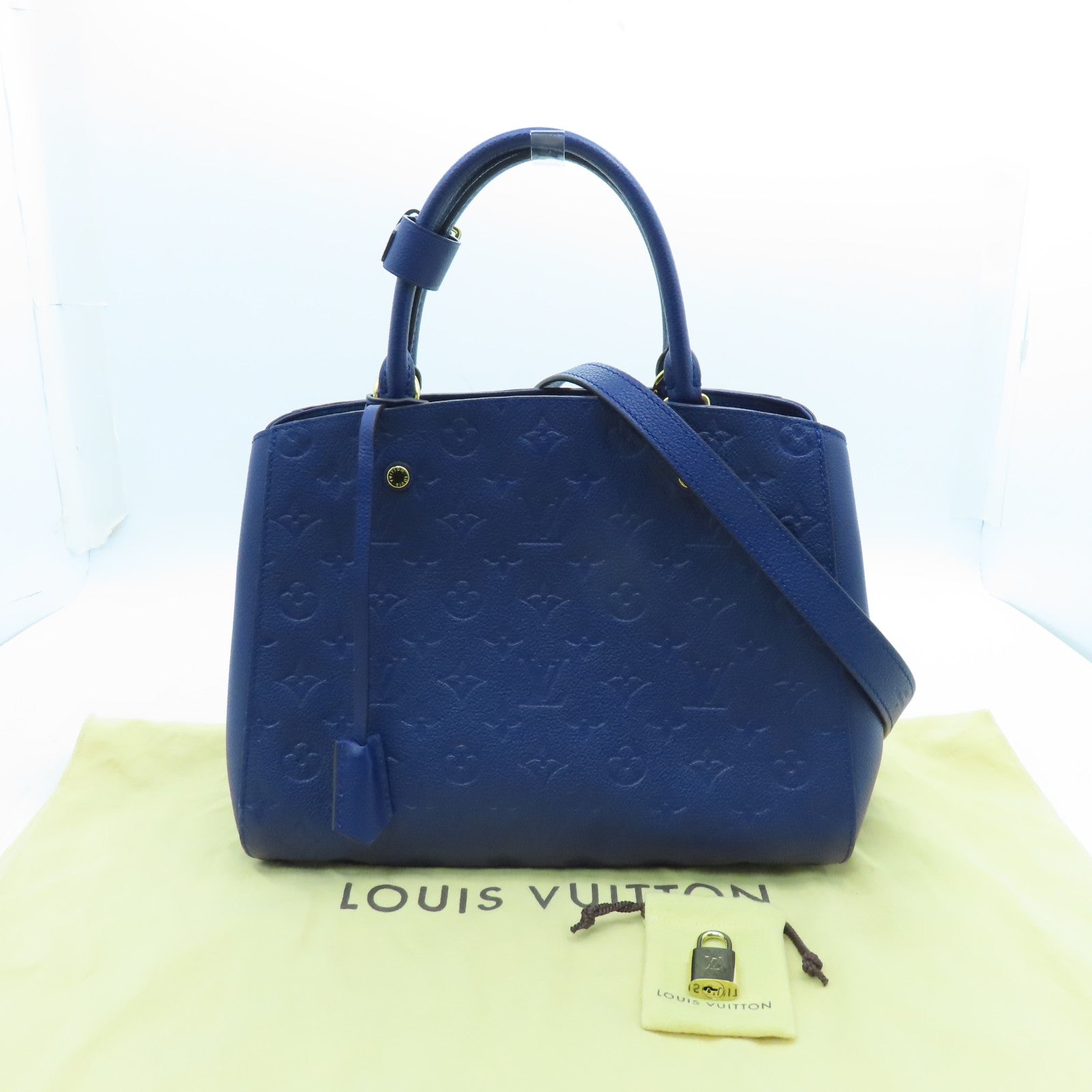 LOUIS VUITTON Monogram Empreinte Montaigne MM gold buckle handle shoulder bag dual-use blue