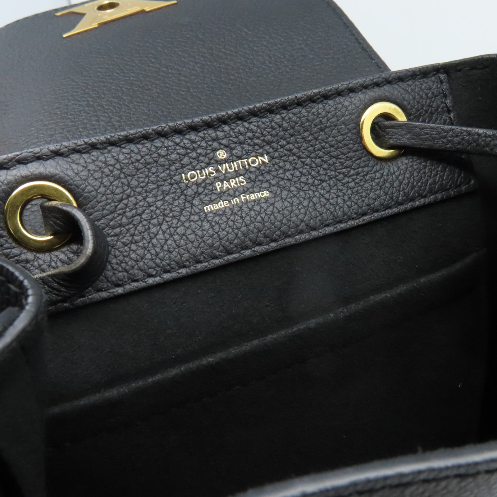 LOUIS VUITTON 牛皮皮革Lock Me Backpack Mini金扣背包黑色