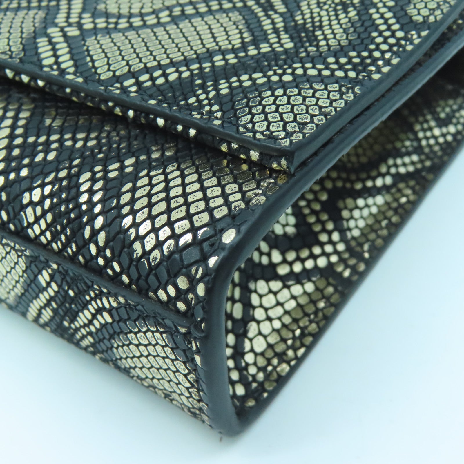 SAINT LAURENT Leather Clutch Bag Gold Buckle Gold/Black