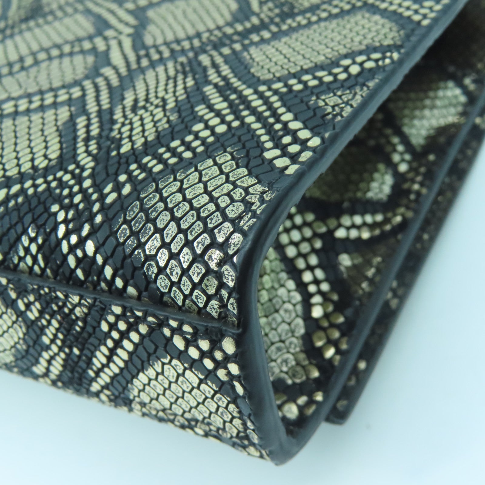 SAINT LAURENT Leather Clutch Bag Gold Buckle Gold/Black