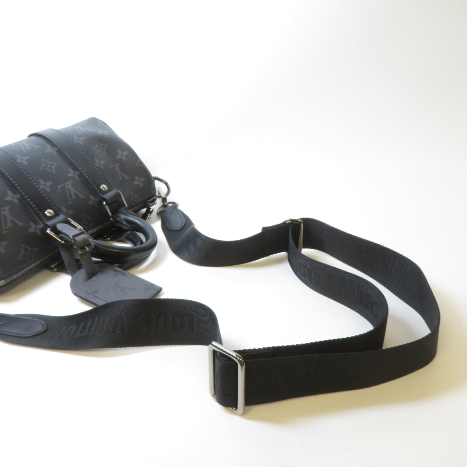 LOUIS VUITTON Monogram Eclipse Reverse Keepall Bandouliere 25銀扣手挽肩背兩用袋黑色