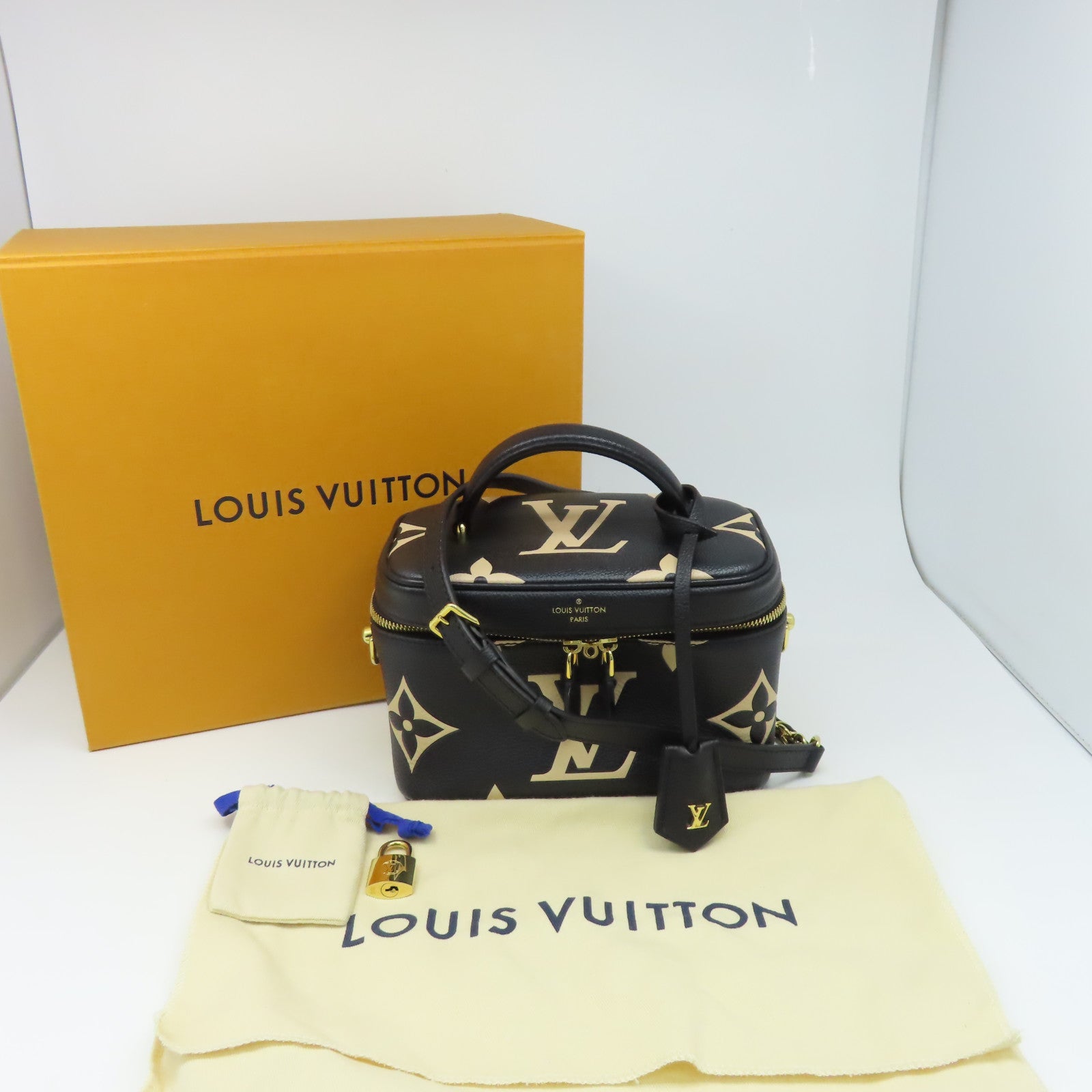 LOUIS VUITTON Monogram Empreinte Vanity PM金扣手挽肩背兩用袋黑色/米色