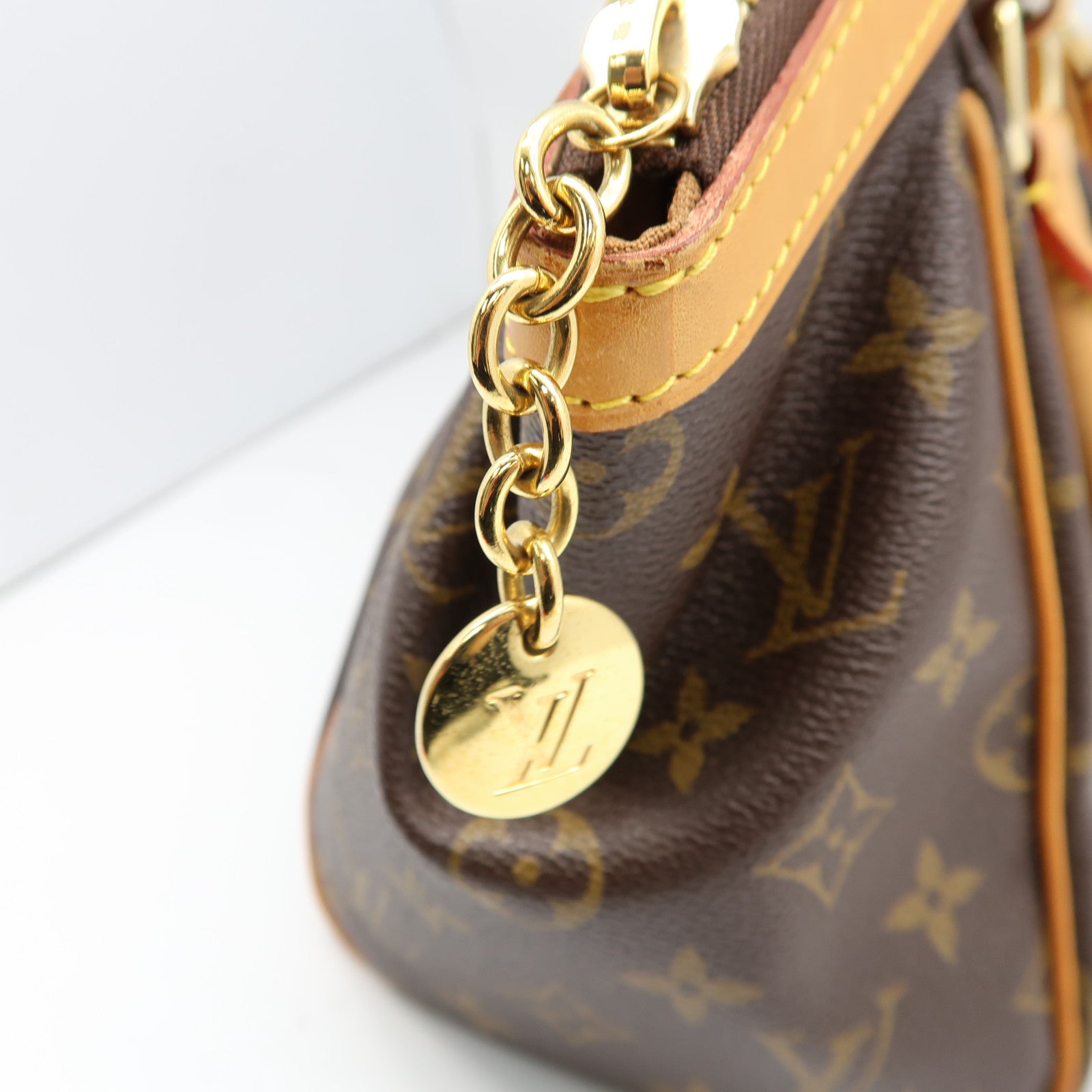 LOUIS VUITTON Monogram Tivoli PM金扣手挽袋啡色