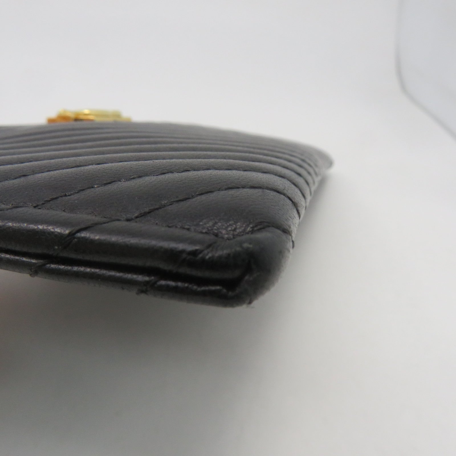 CHANEL 斜紋牛皮皮革Pouch金扣手提包黑色