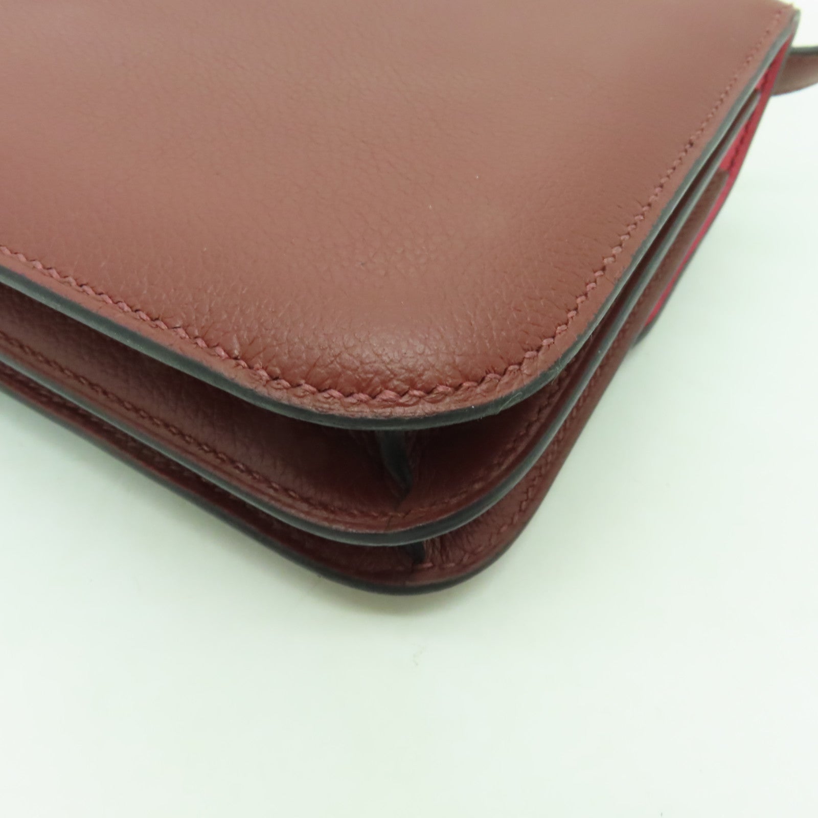 HERMES 【激減優惠】Clemence皮革Constance Mini銀扣肩背袋Rough Sellier酒紅色