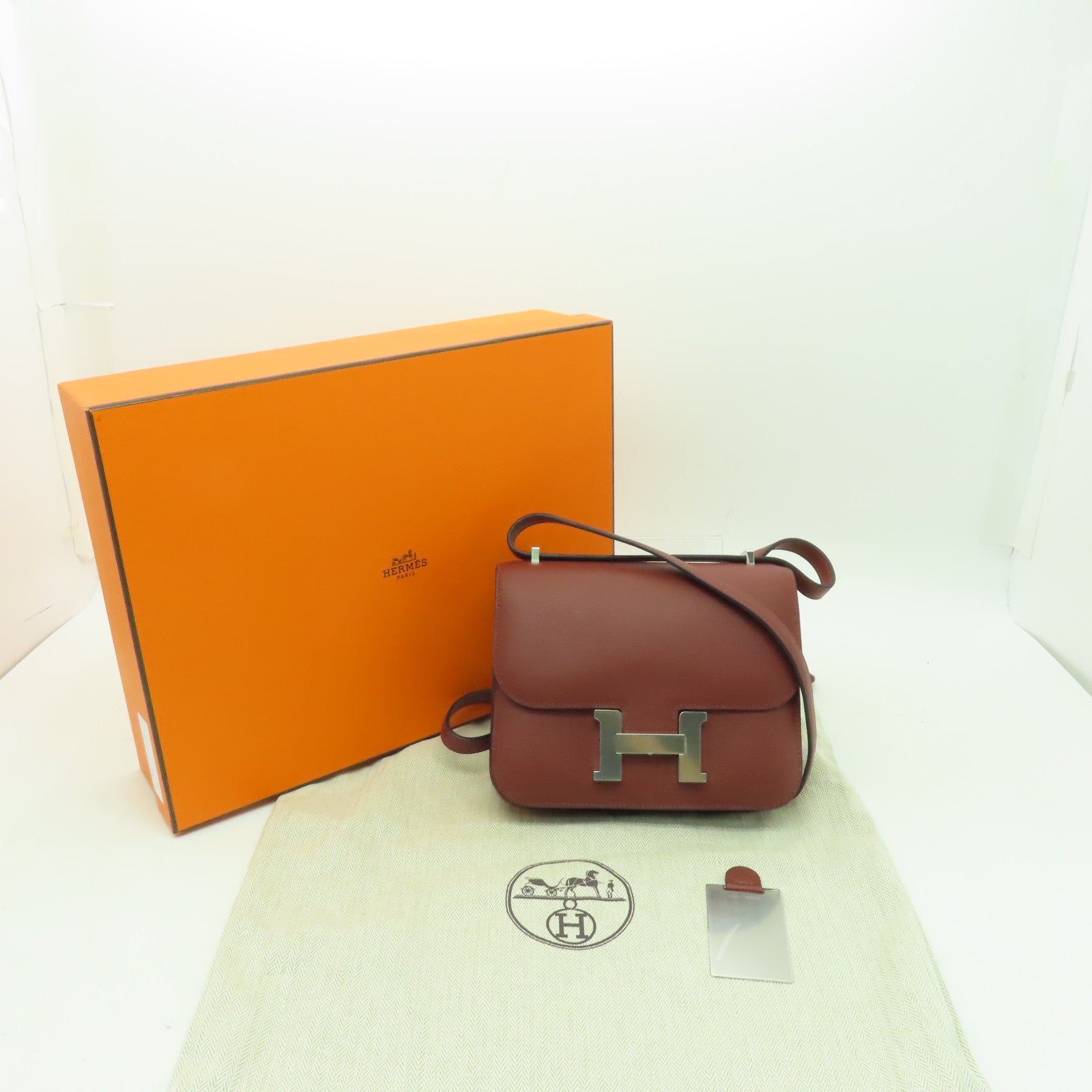 HERMES 【激減優惠】Clemence皮革Constance Mini銀扣肩背袋Rough Sellier酒紅色