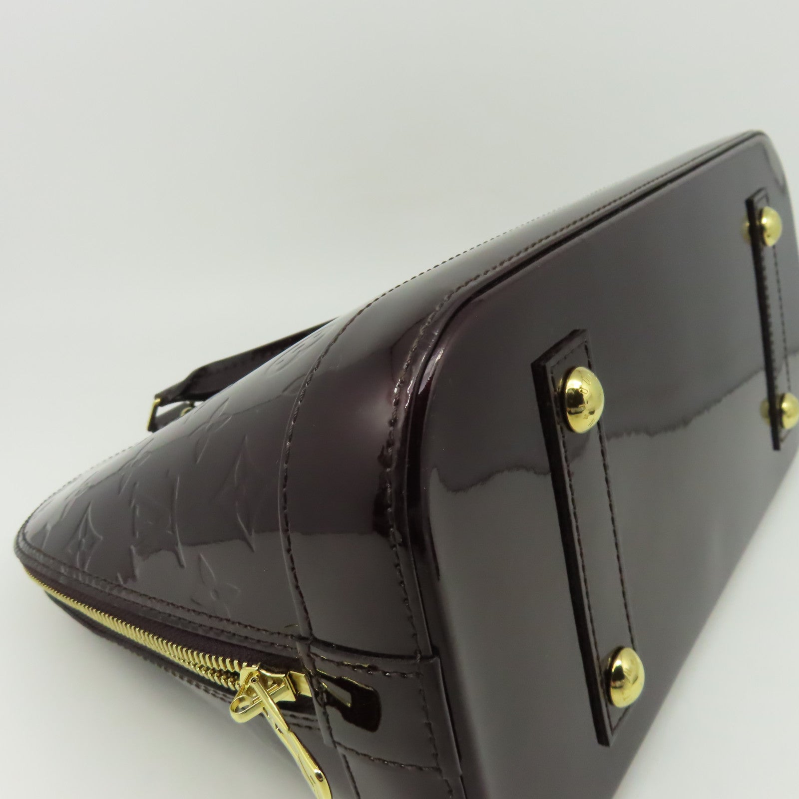 LOUIS VUITTON Monogram Vernis Alma PM金扣手挽袋深紅色