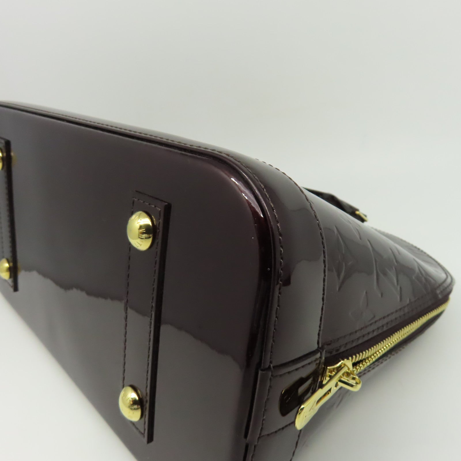 LOUIS VUITTON Monogram Vernis Alma PM金扣手挽袋深紅色