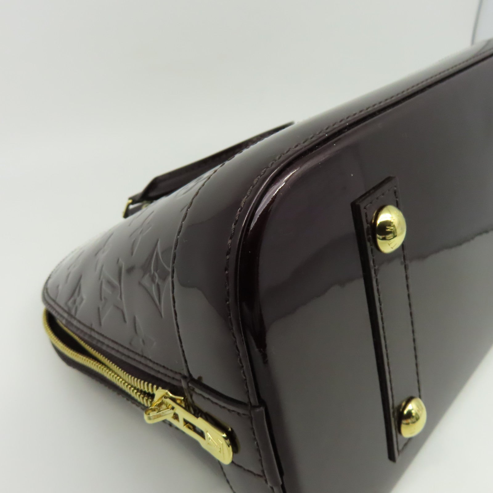 LOUIS VUITTON Monogram Vernis Alma PM金扣手挽袋深紅色