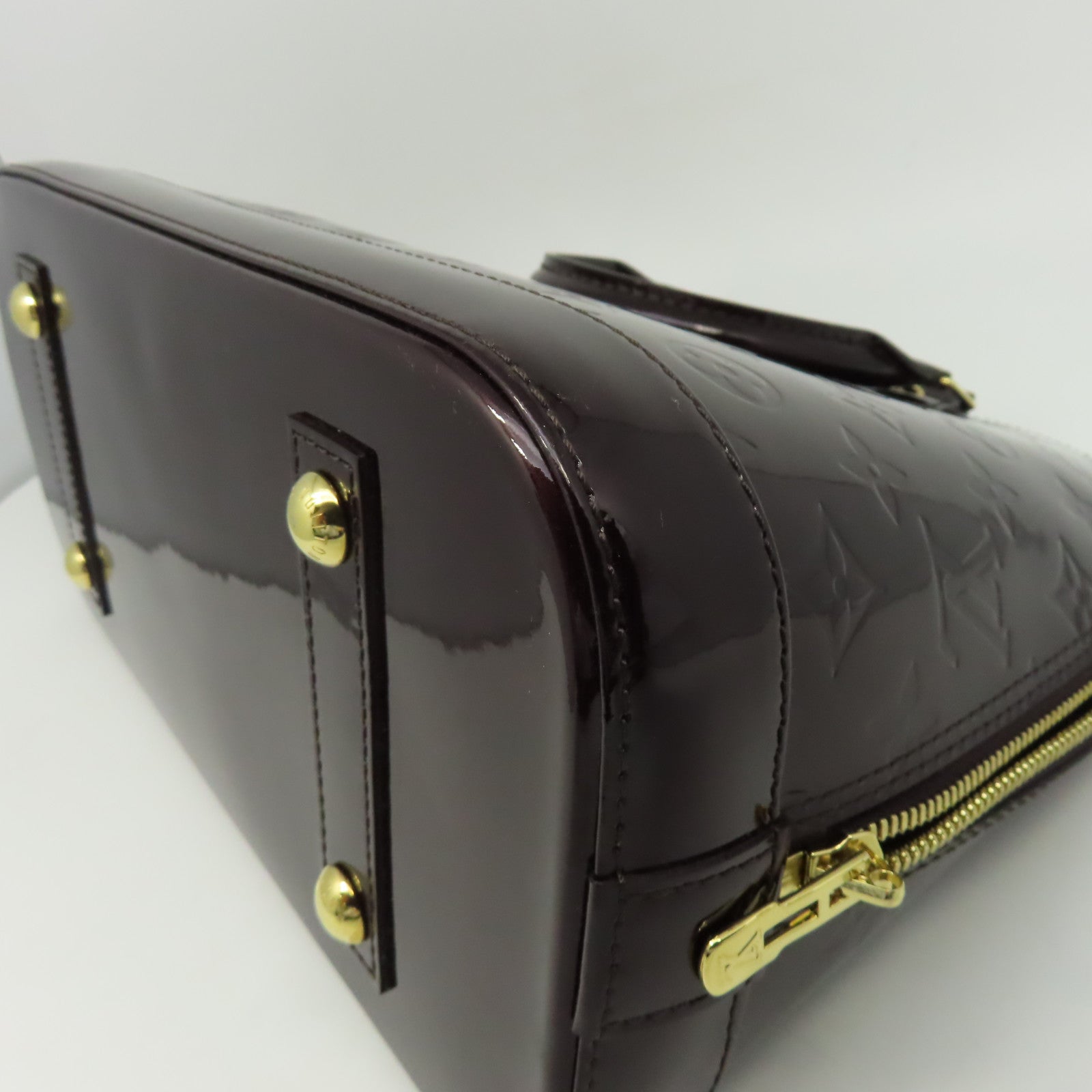 LOUIS VUITTON Monogram Vernis Alma PM金扣手挽袋深紅色
