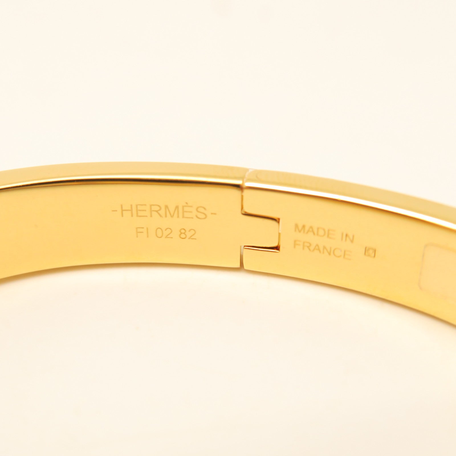 HERMES Metal/Ceramic Mini Clic CDA Bracelet Yellow/White