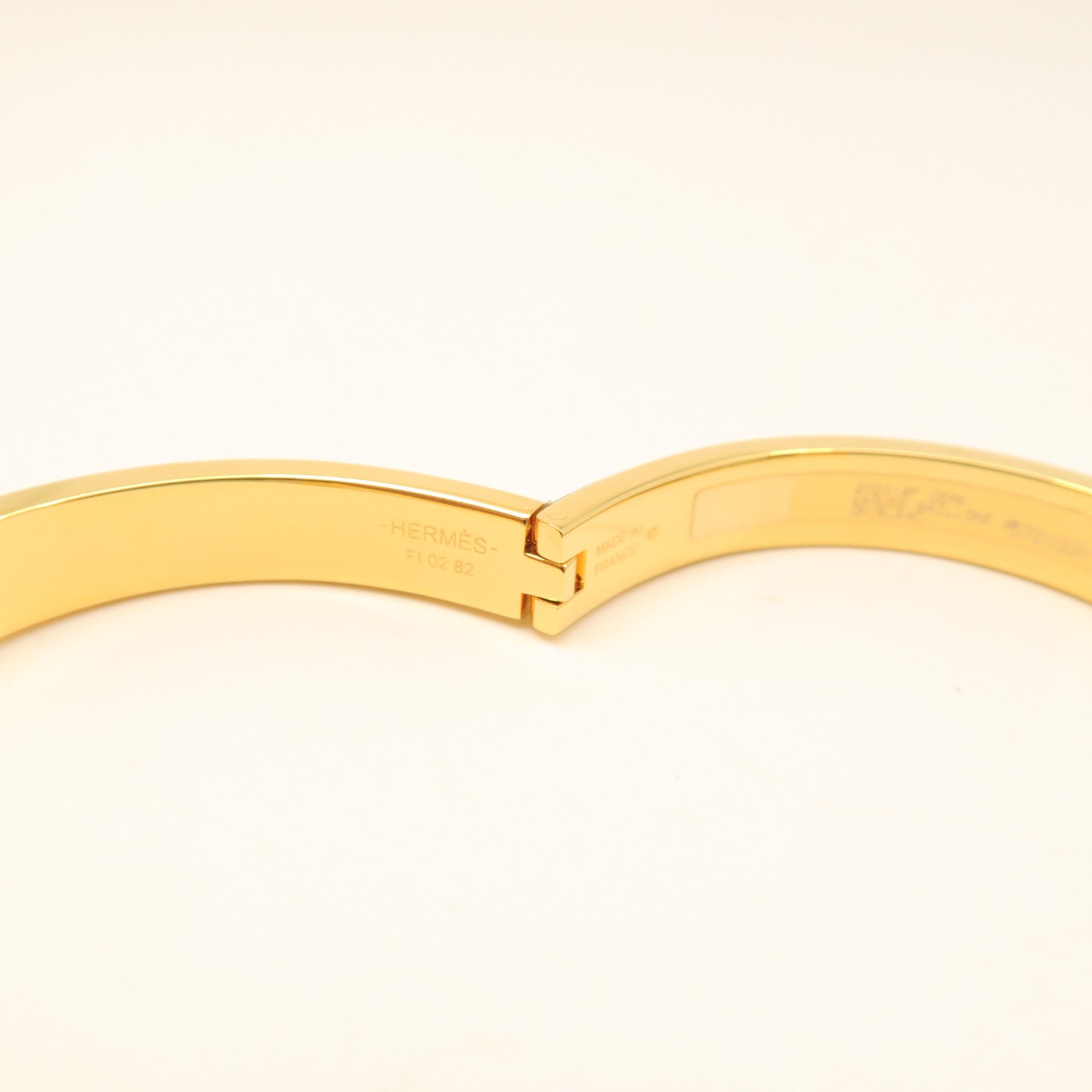 HERMES Metal/Ceramic Mini Clic CDA Bracelet Yellow/White
