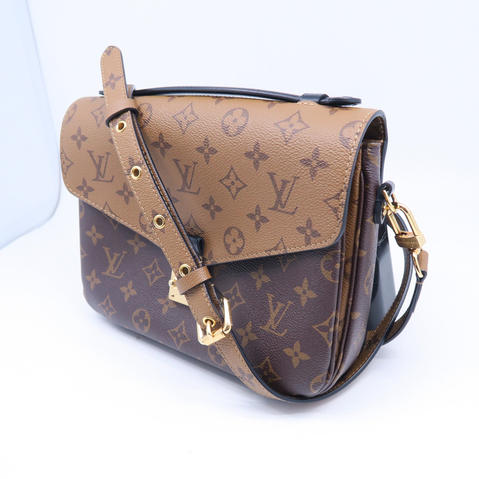 LOUIS VUITTON Monogram Reverse Pochette Meits金扣手挽肩背兩用袋棕色