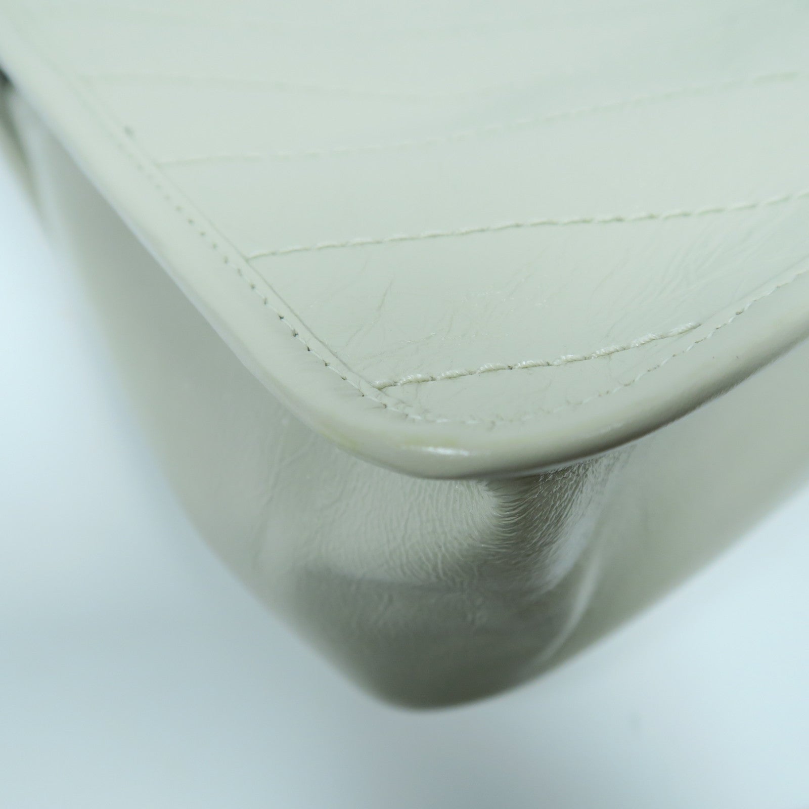 SAINT LAURENT 斜紋牛皮皮革Niki銀扣肩背袋白色