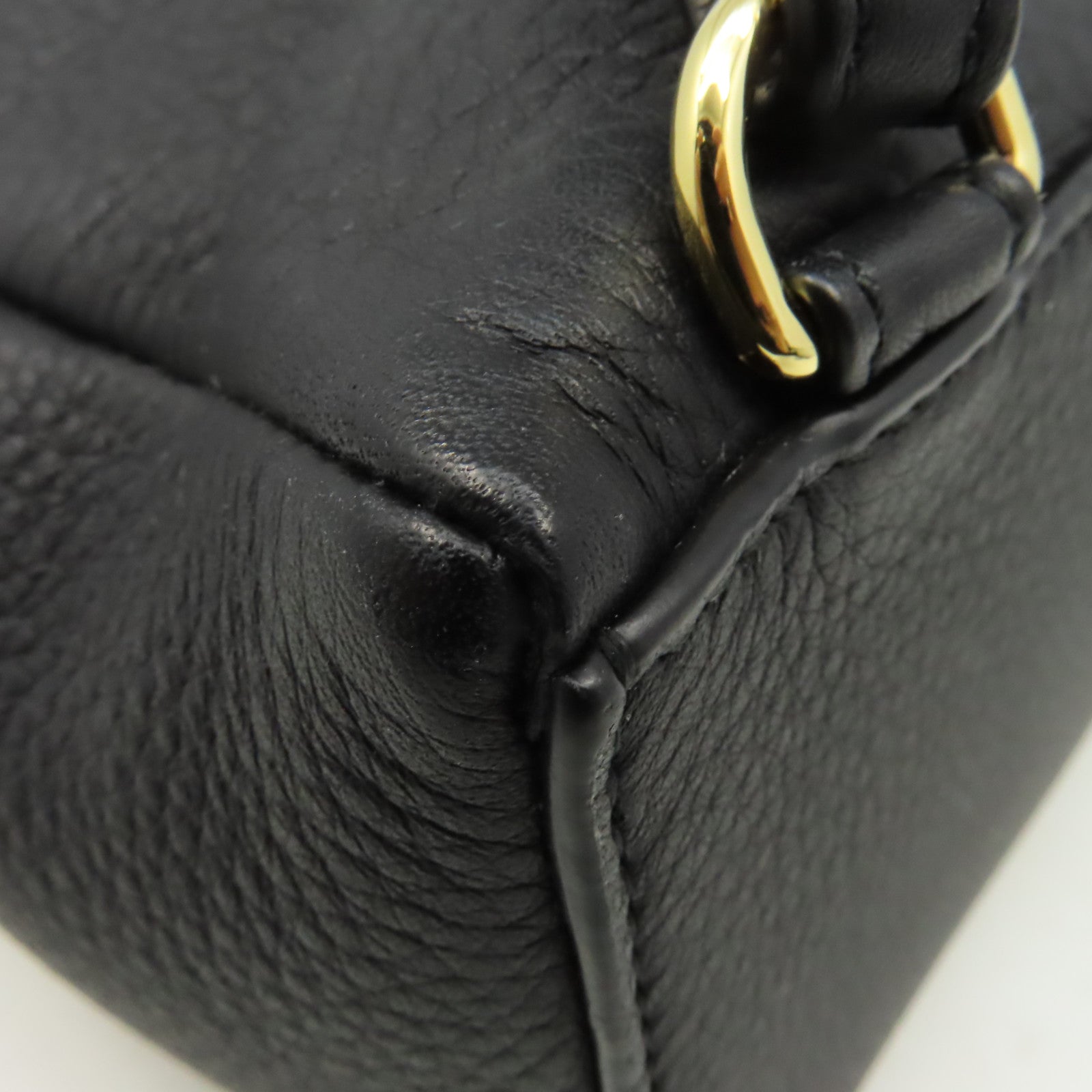 Loro Piana 牛皮皮革Backpack金扣背包黑色