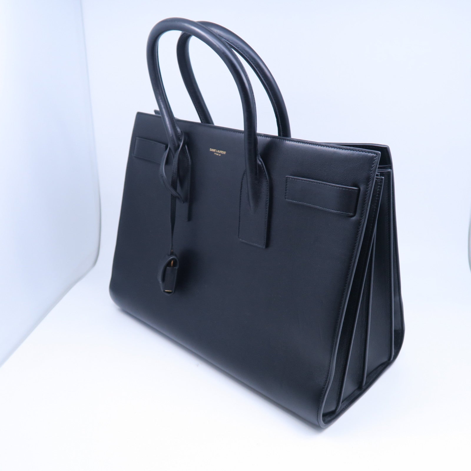 SAINT LAURENT 牛皮皮革Sac De Jou金扣手挽袋黑色