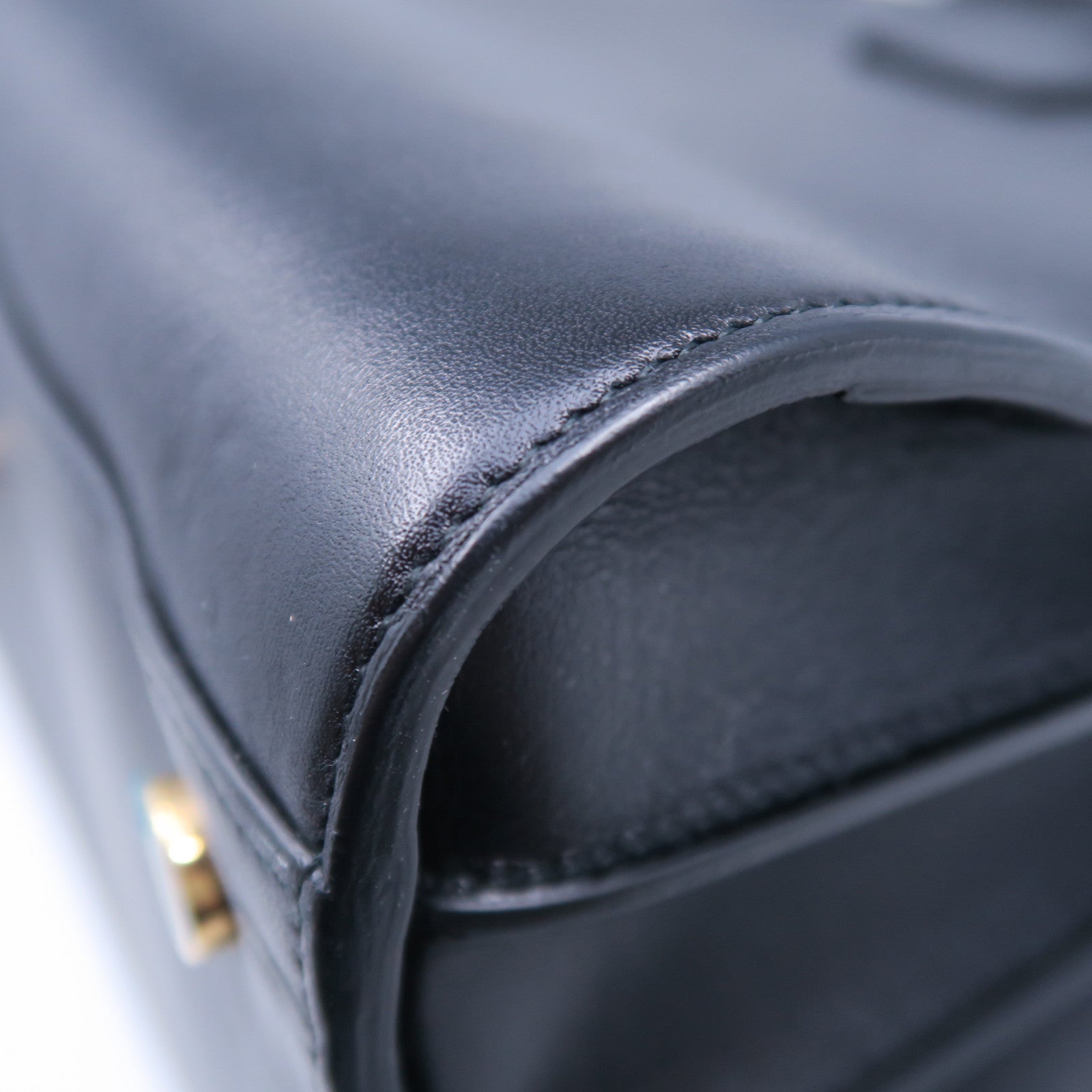 SAINT LAURENT 牛皮皮革Sac De Jou金扣手挽袋黑色