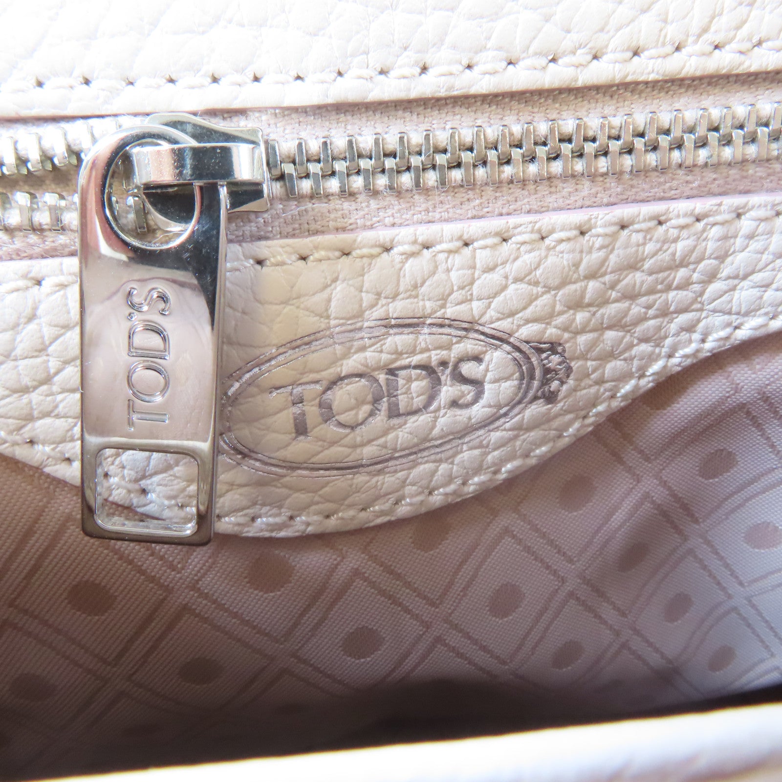 TOD’S 牛皮皮革Backpack銀扣背包米色