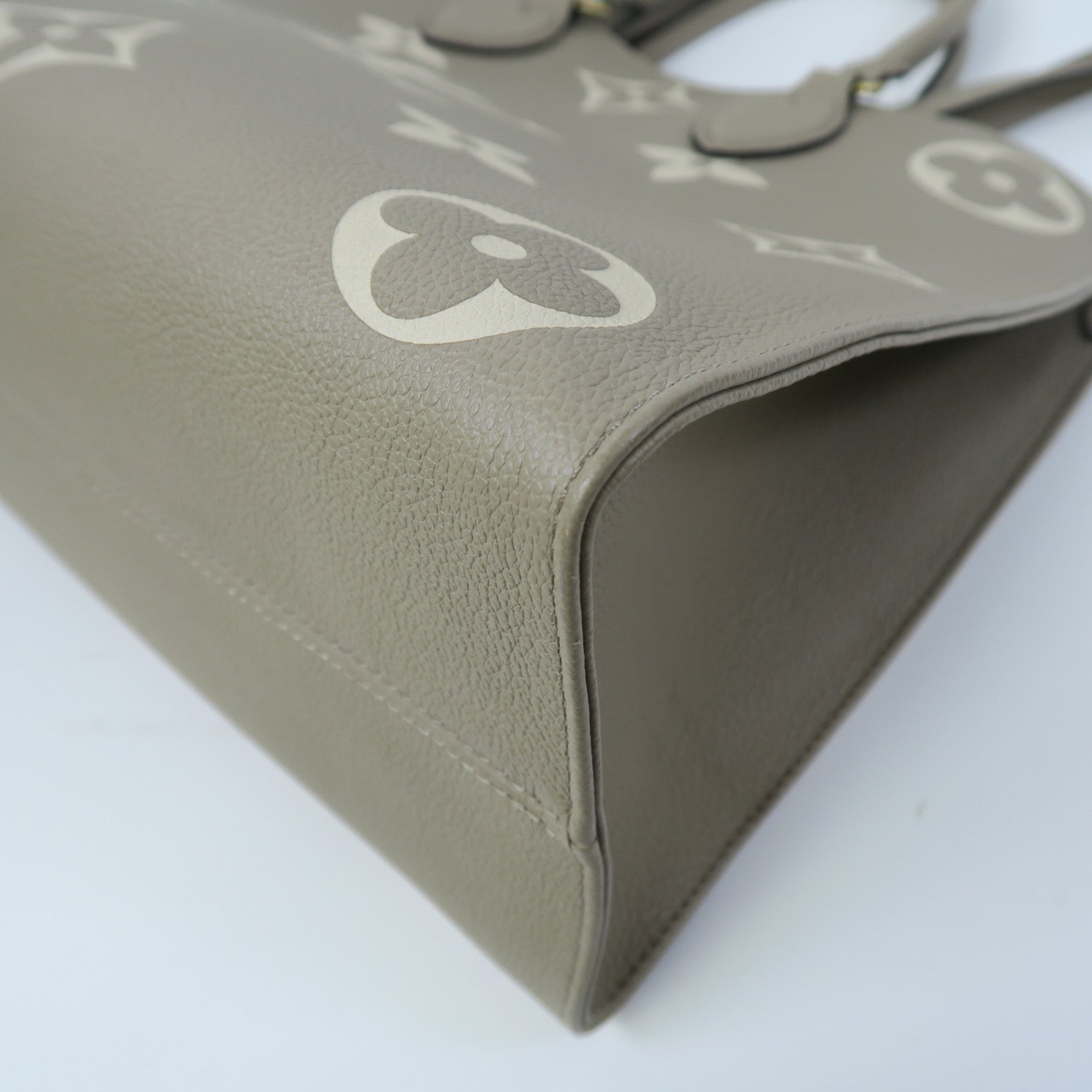 LOUIS VUITTON Monogram Empreinte OnTheGo MM金扣手挽肩背兩用袋斑鳩灰色/奶油色