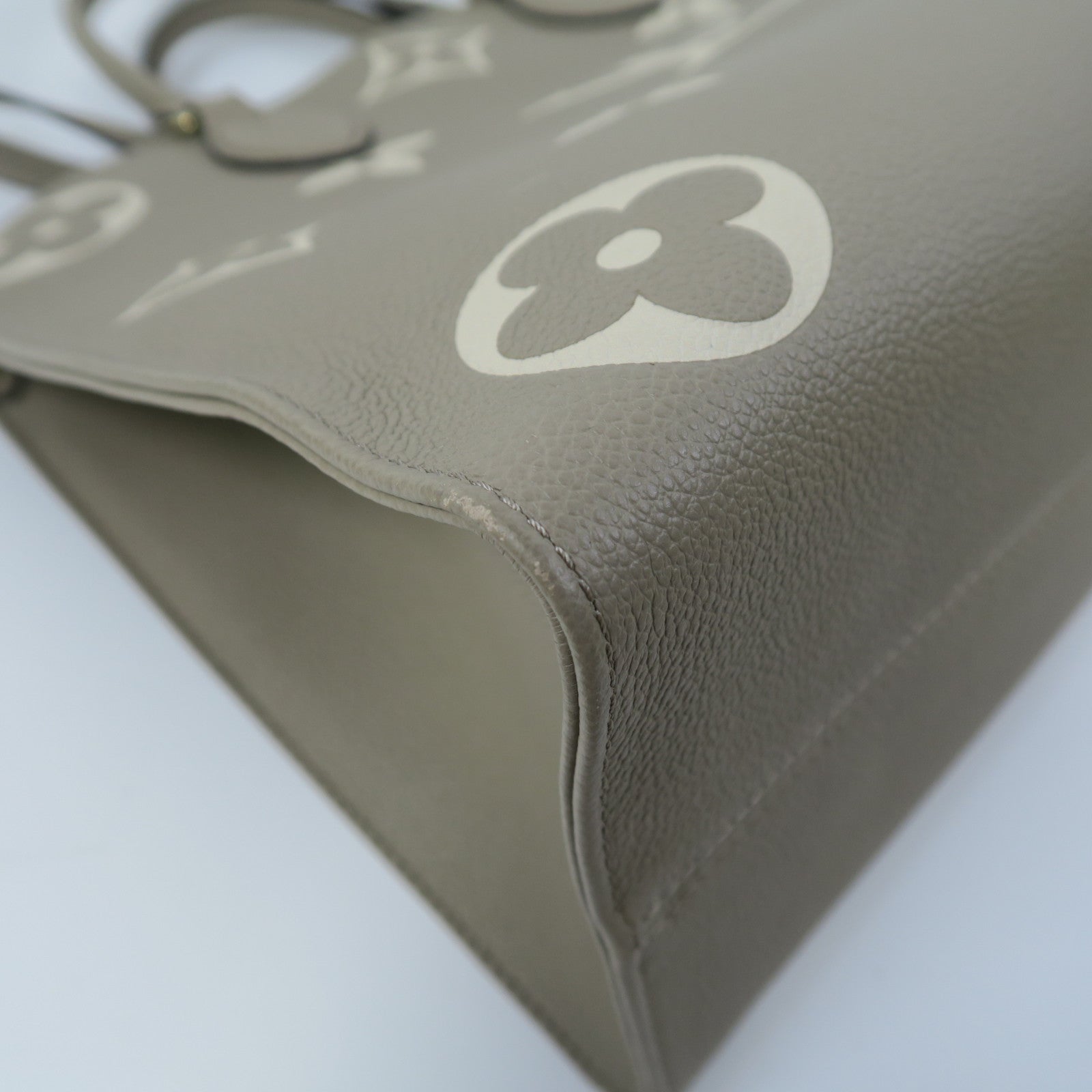LOUIS VUITTON Monogram Empreinte OnTheGo MM金扣手挽肩背兩用袋斑鳩灰色/奶油色
