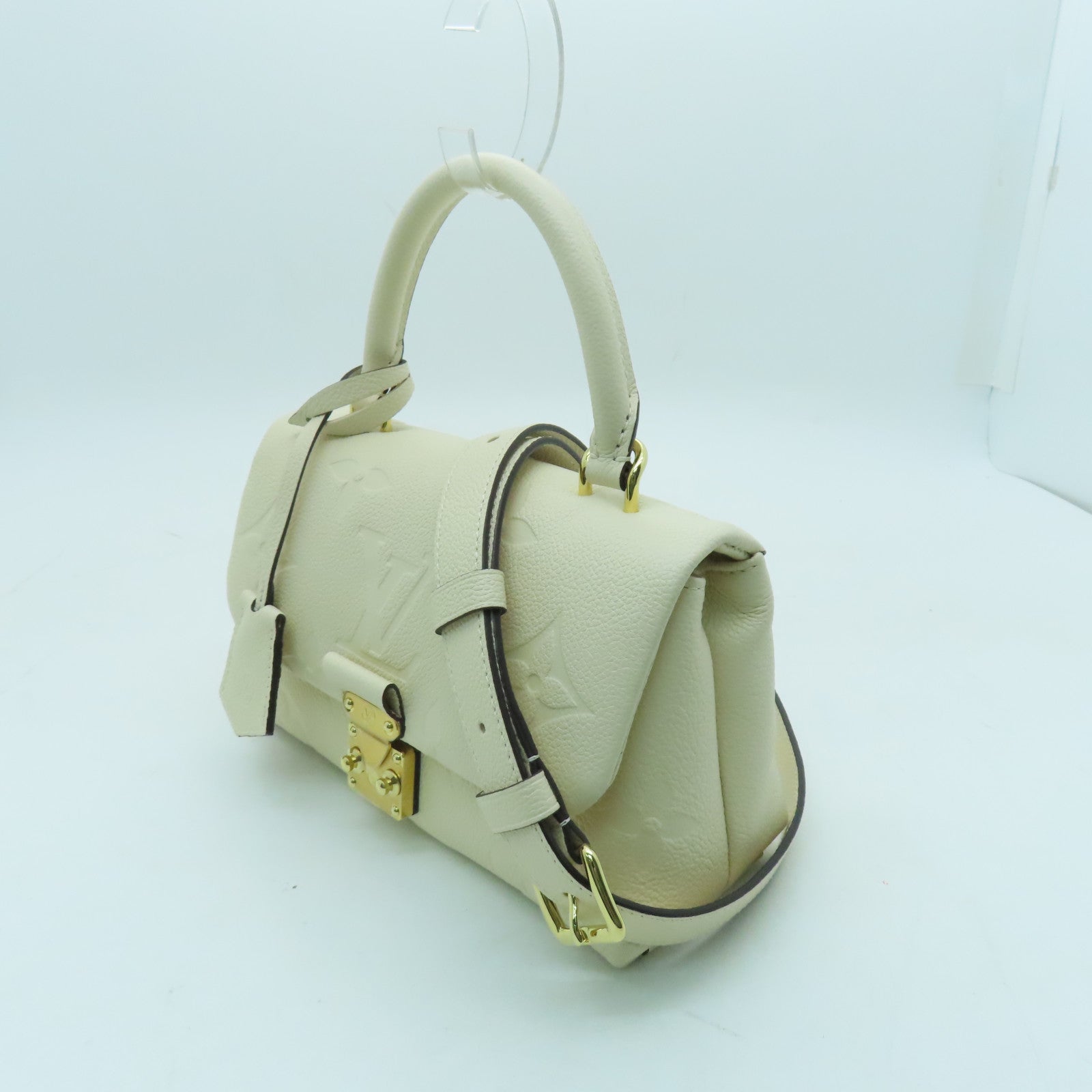 LOUIS VUITTON Monogram Empreinte Madeleine BB gold buckle shoulder shoulder bag white