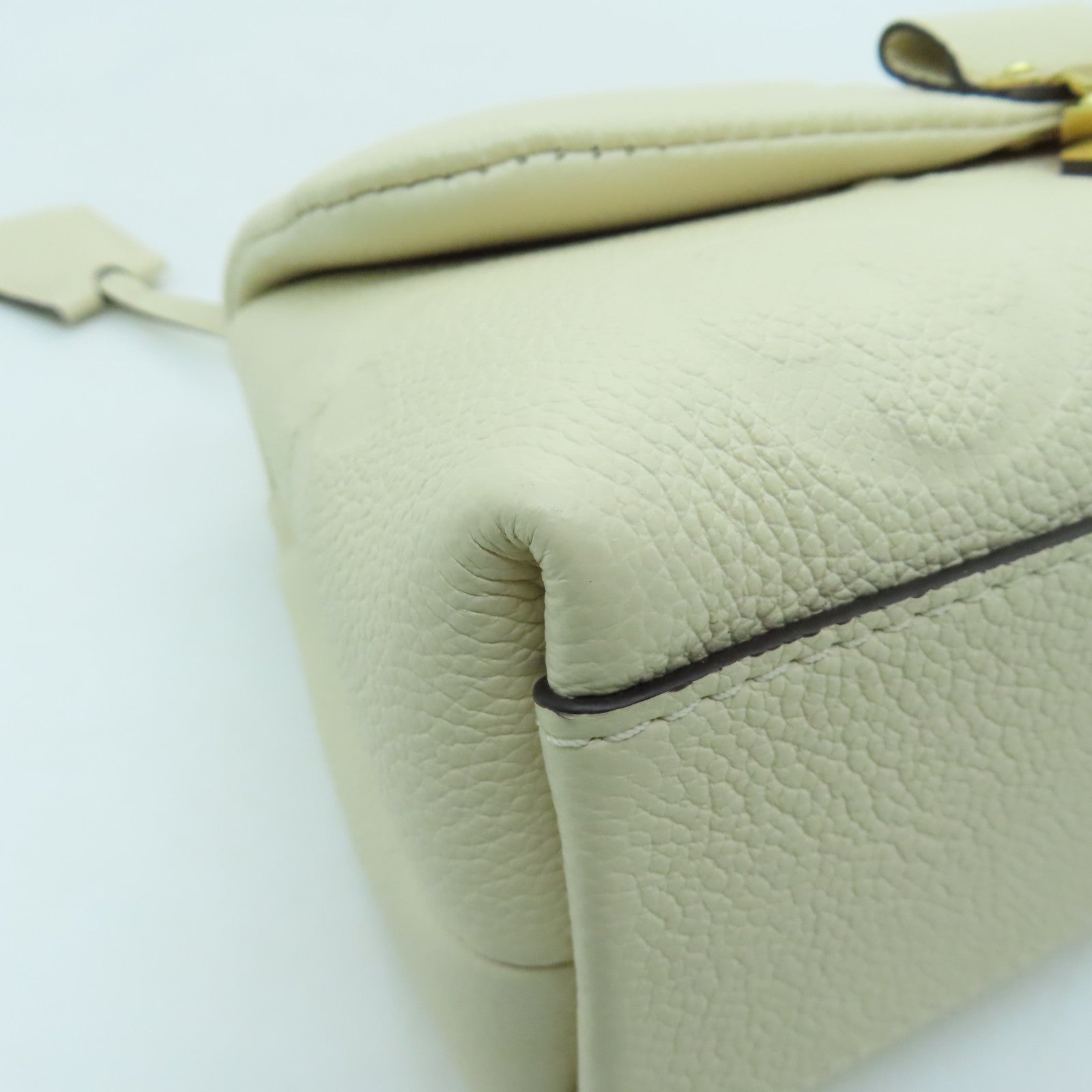 LOUIS VUITTON Monogram Empreinte Madeleine BB gold buckle shoulder shoulder bag white
