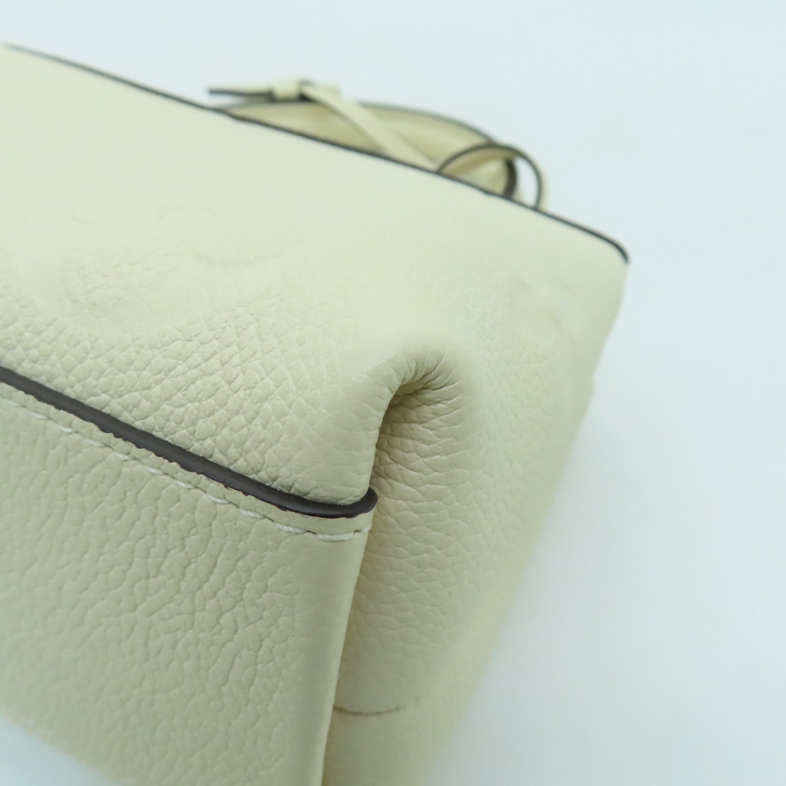 LOUIS VUITTON Monogram Empreinte Madeleine BB gold buckle shoulder shoulder bag white
