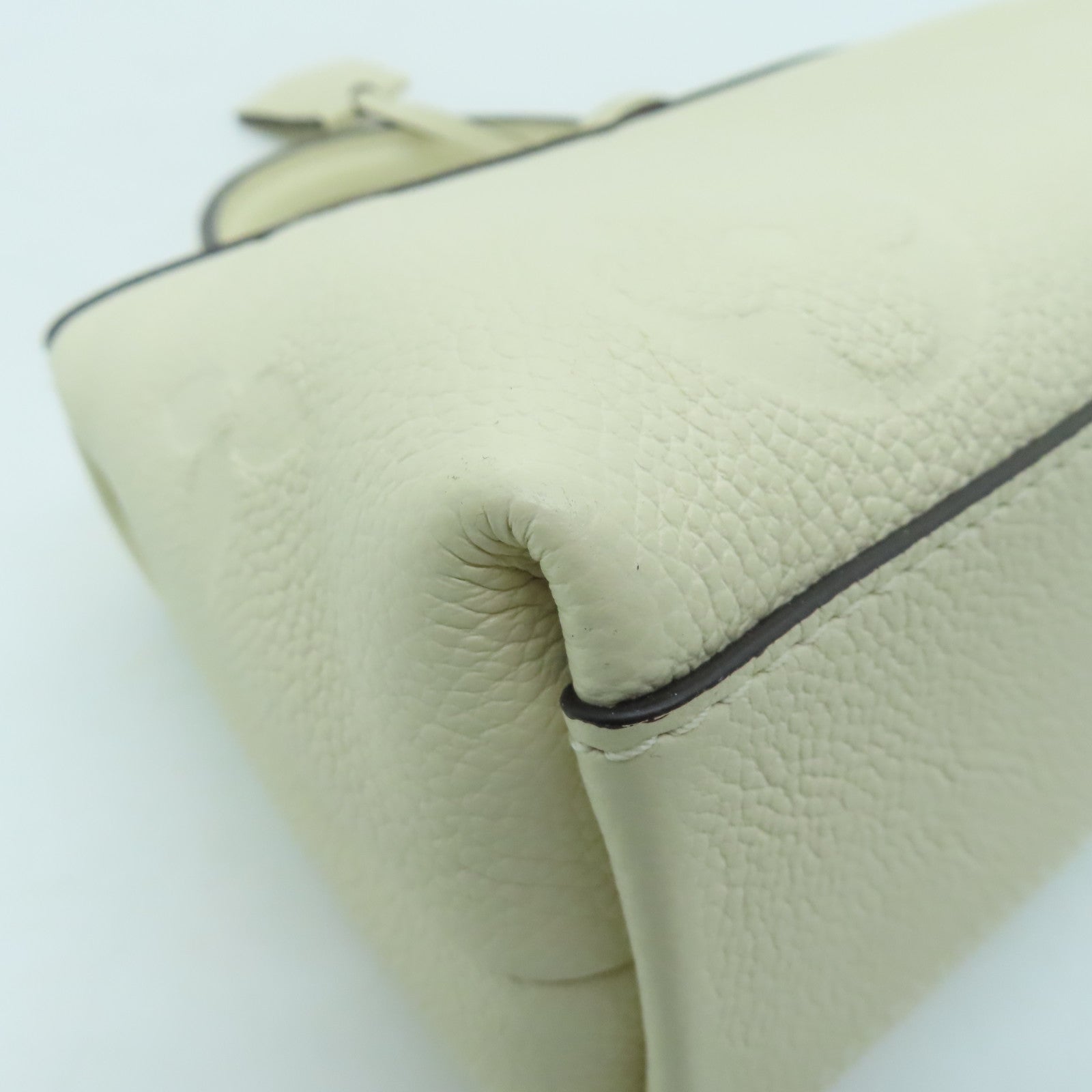 LOUIS VUITTON Monogram Empreinte Madeleine BB gold buckle shoulder shoulder bag white