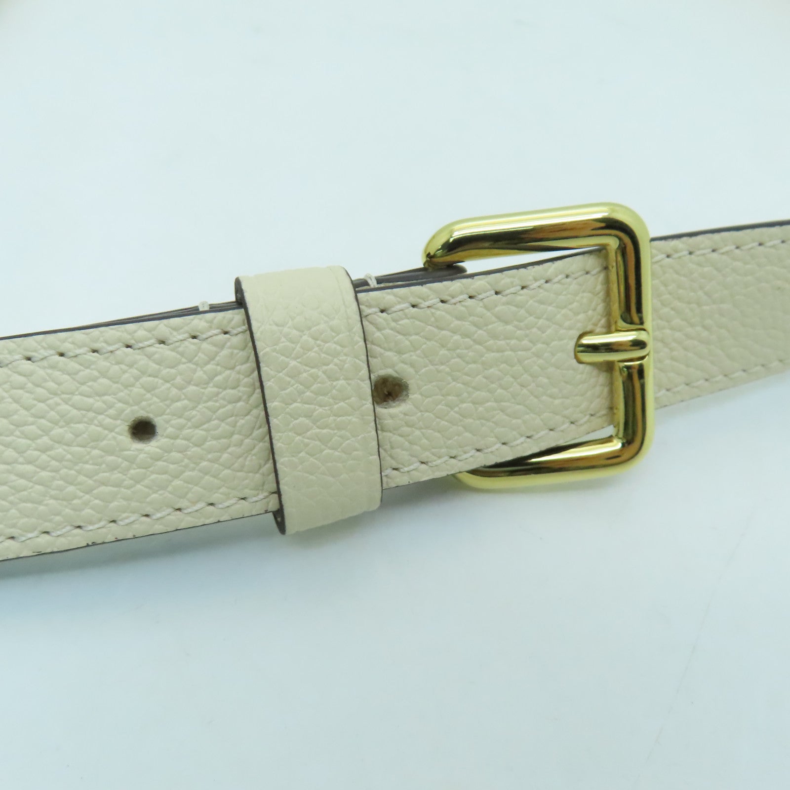 LOUIS VUITTON Monogram Empreinte Madeleine BB gold buckle shoulder shoulder bag white